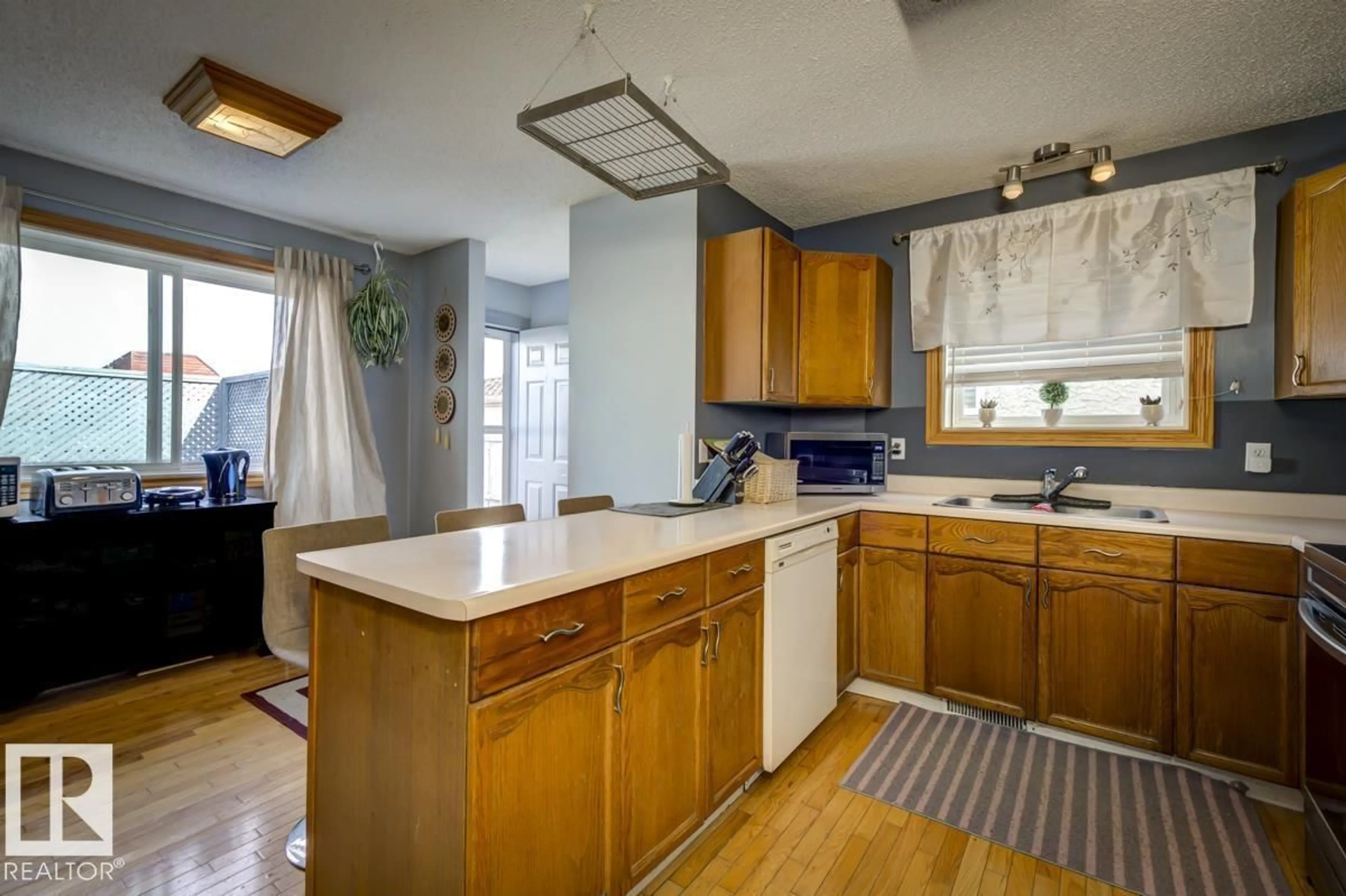 Open concept kitchen, unknown for 1187 LAKEWOOD RD, Edmonton Alberta T6K4C6