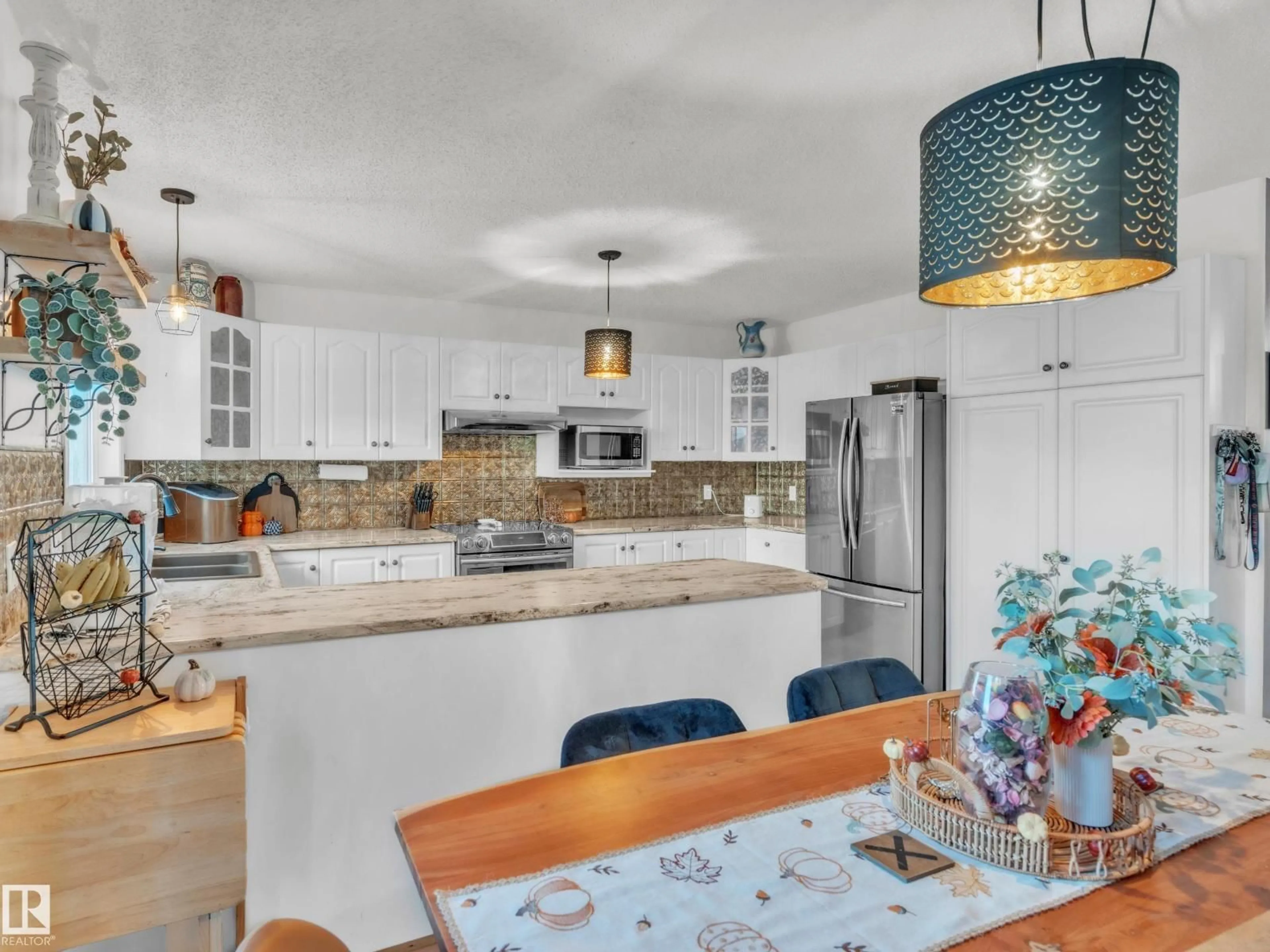 Open concept kitchen, ceramic/tile floor for 922 12 ST, Cold Lake Alberta T9M1K2