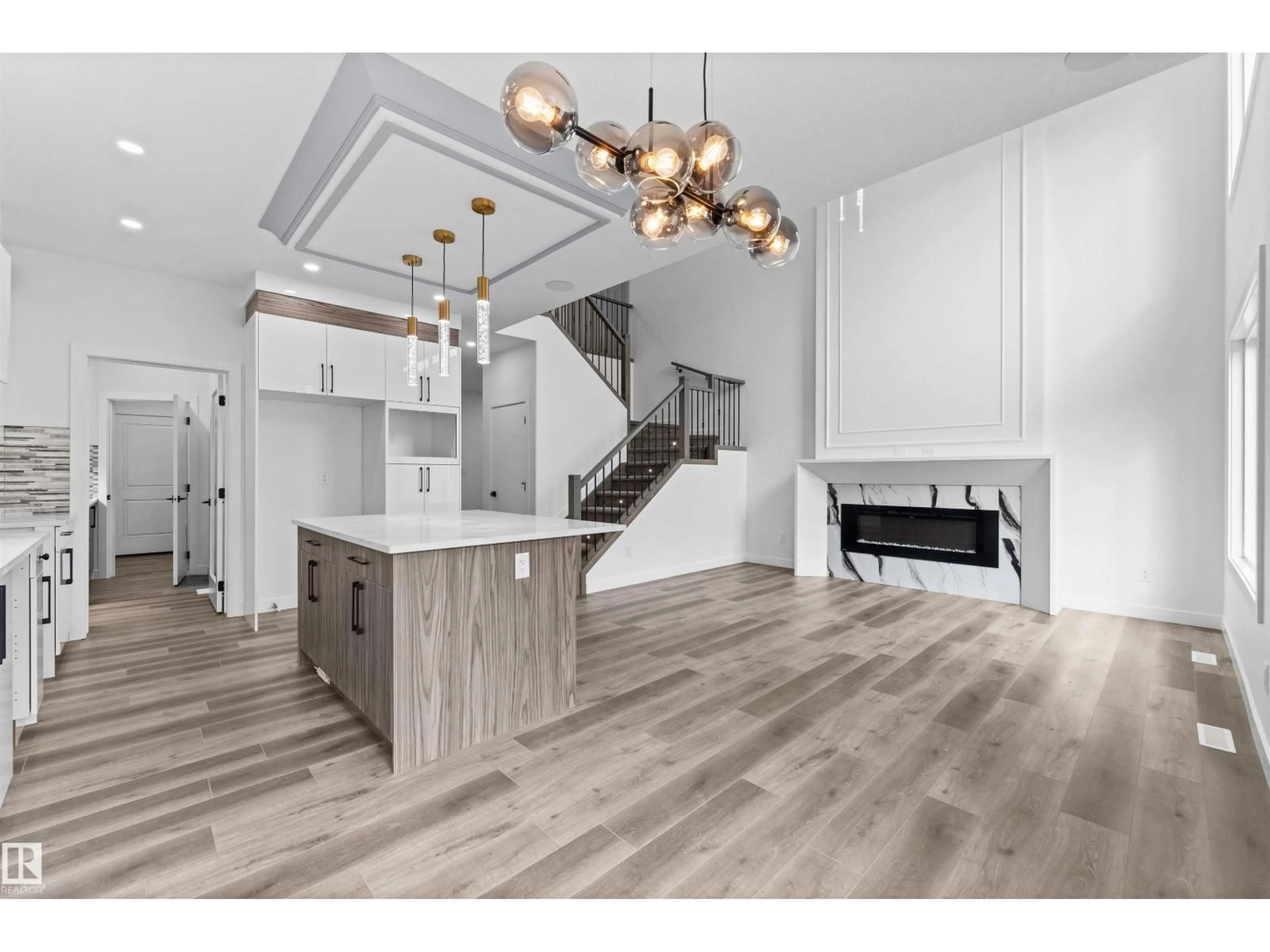Open concept kitchen, wood/laminate floor for 1727 60 AV, Rural Leduc County Alberta T4X3C5