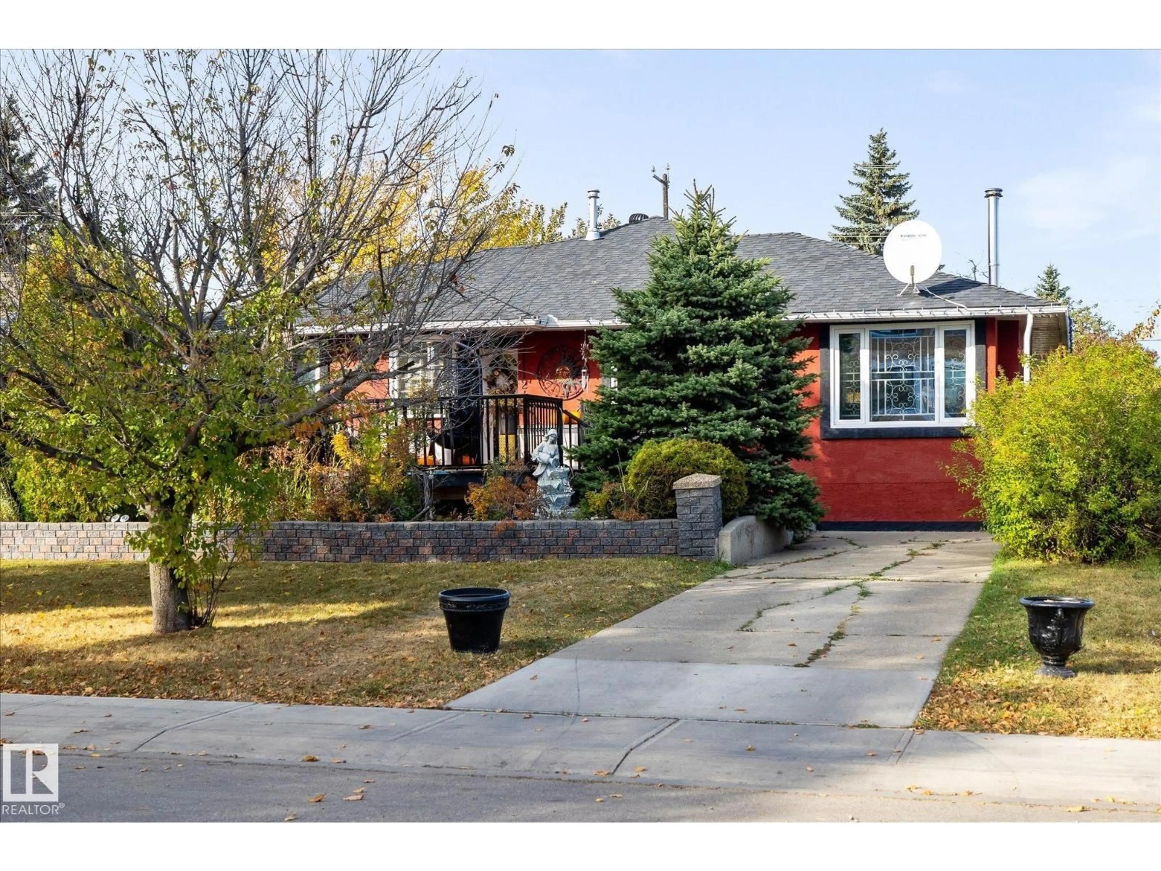 Home with brick exterior material, street for NW - 11124 110A AV, Edmonton Alberta T5H1K1