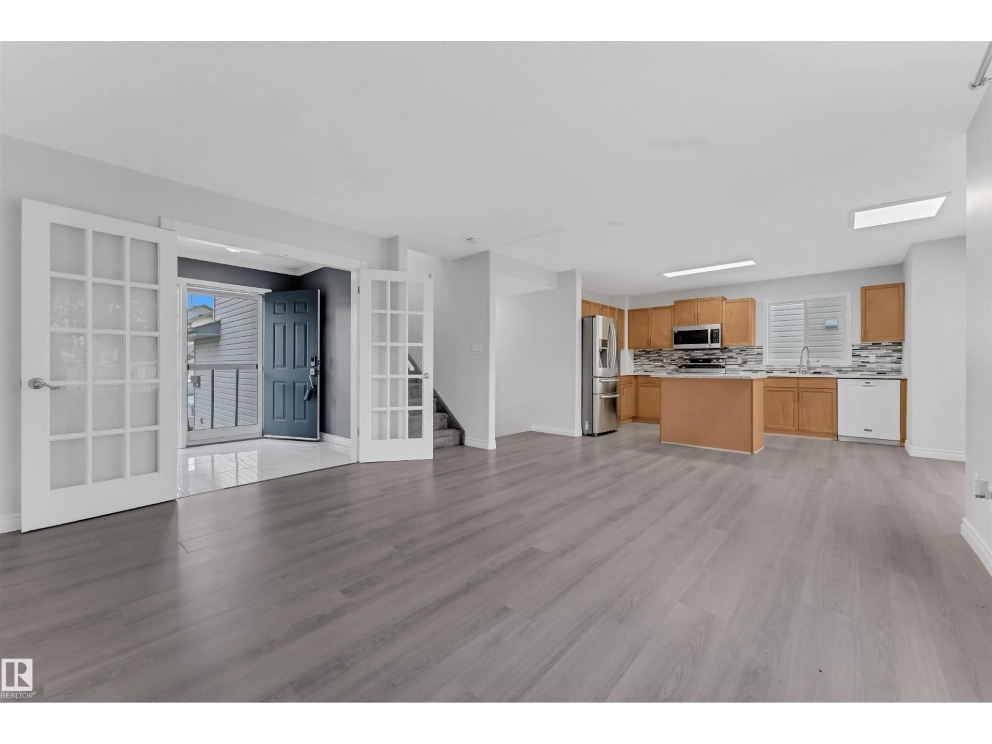 Open concept kitchen, unknown for 3323 26 AV, Edmonton Alberta T6T1P9