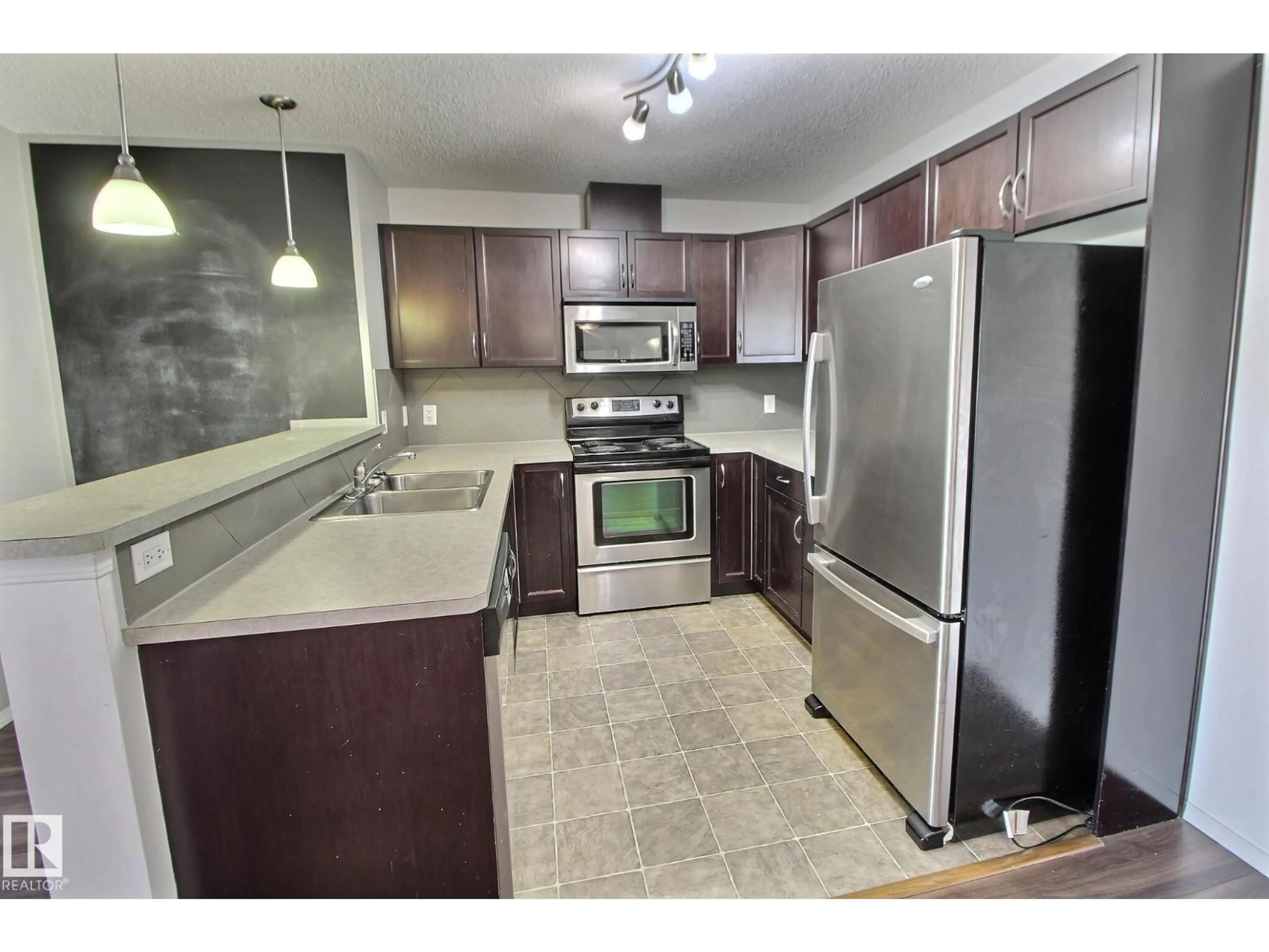 Standard kitchen, unknown for 205 5951 165 AV NW, Edmonton Alberta T5Y0J6