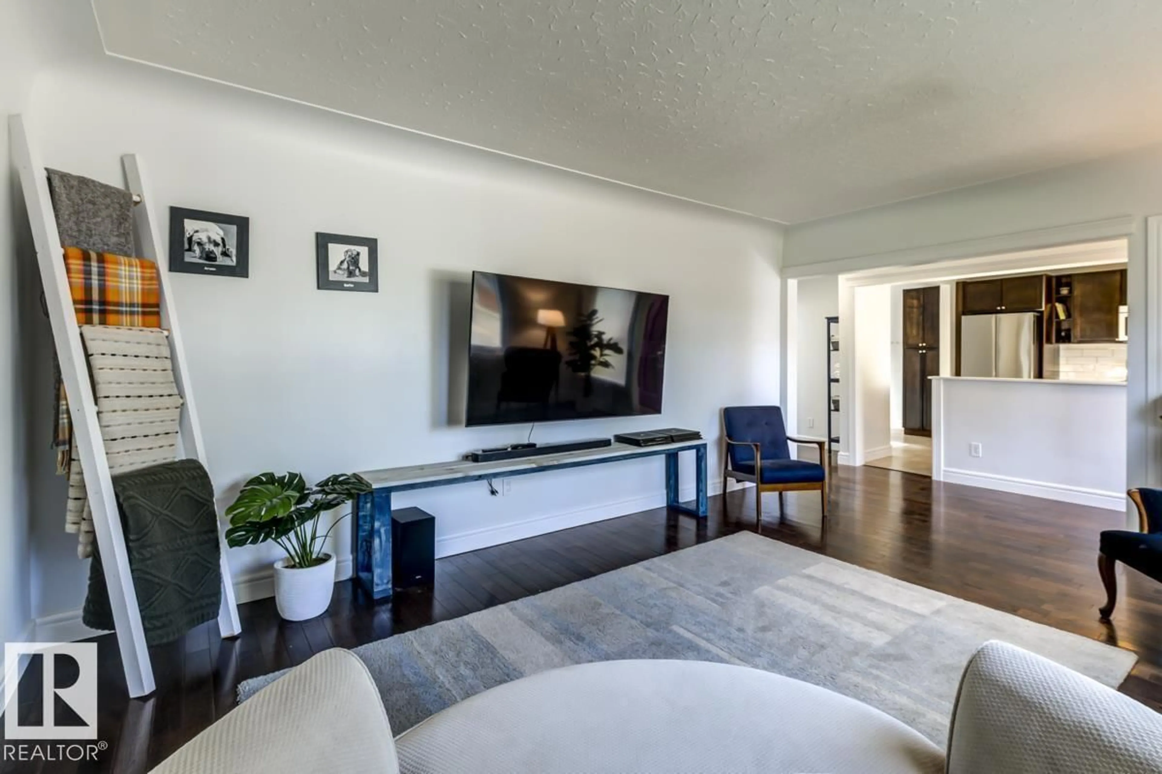 Living room with furniture, unknown for 13619 122 AV, Edmonton Alberta T5L2W1