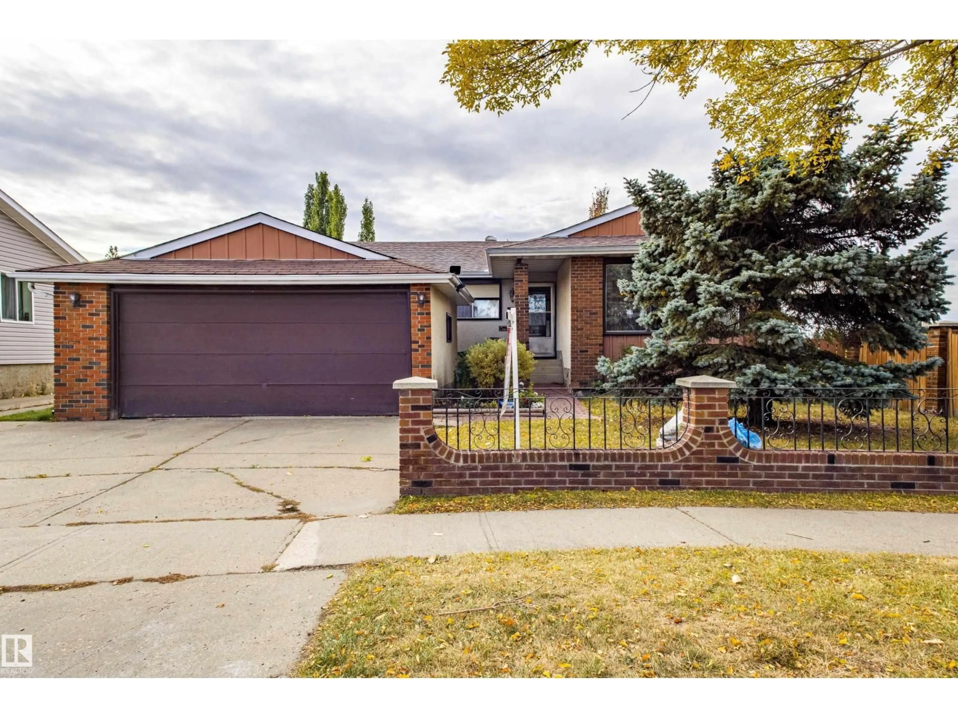 Home with brick exterior material, street for 11455 162 AV, Edmonton Alberta T5X2L4
