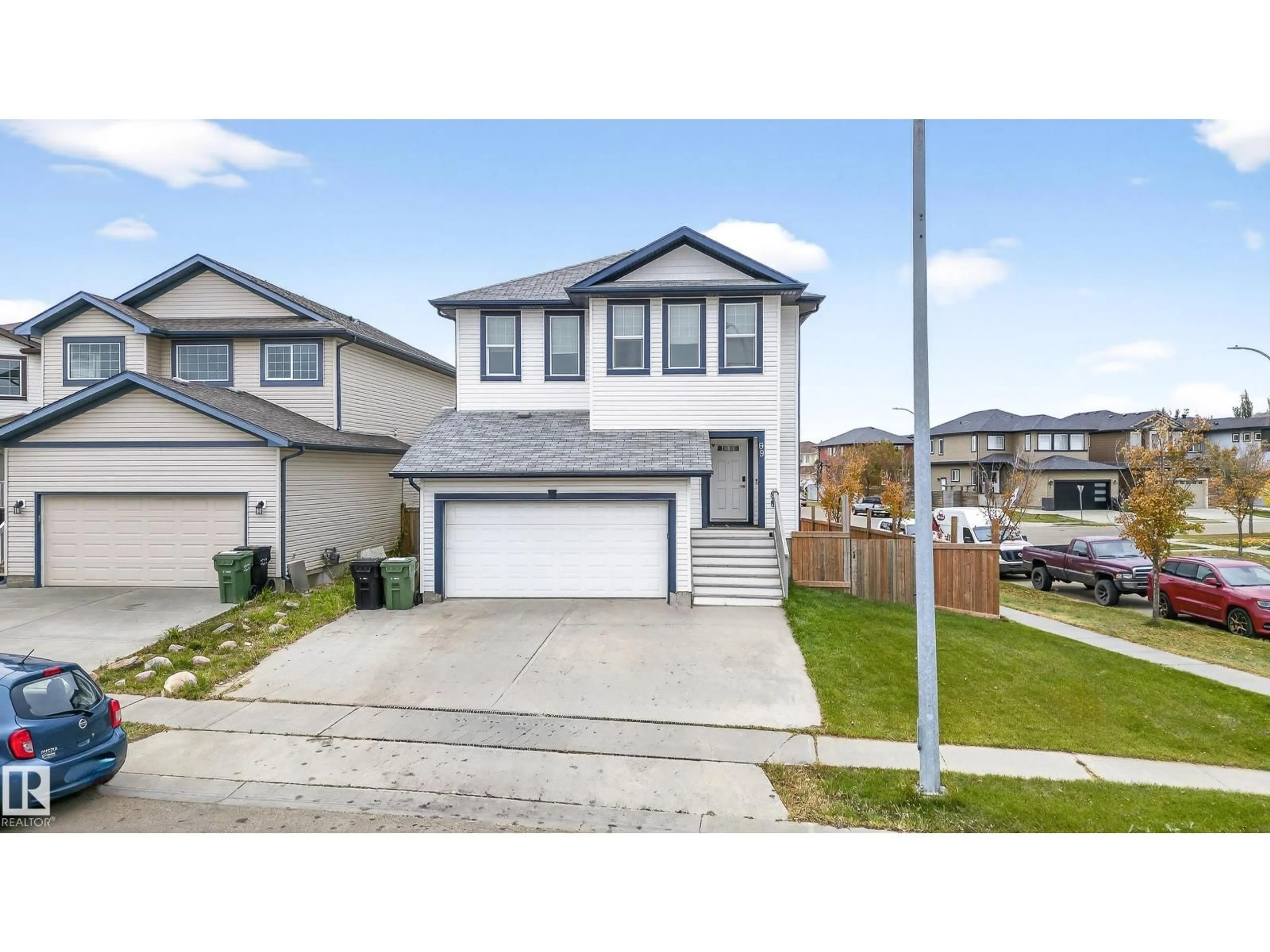Home with vinyl exterior material, street for 99 DALQUIST BA, Leduc Alberta T9E0J7