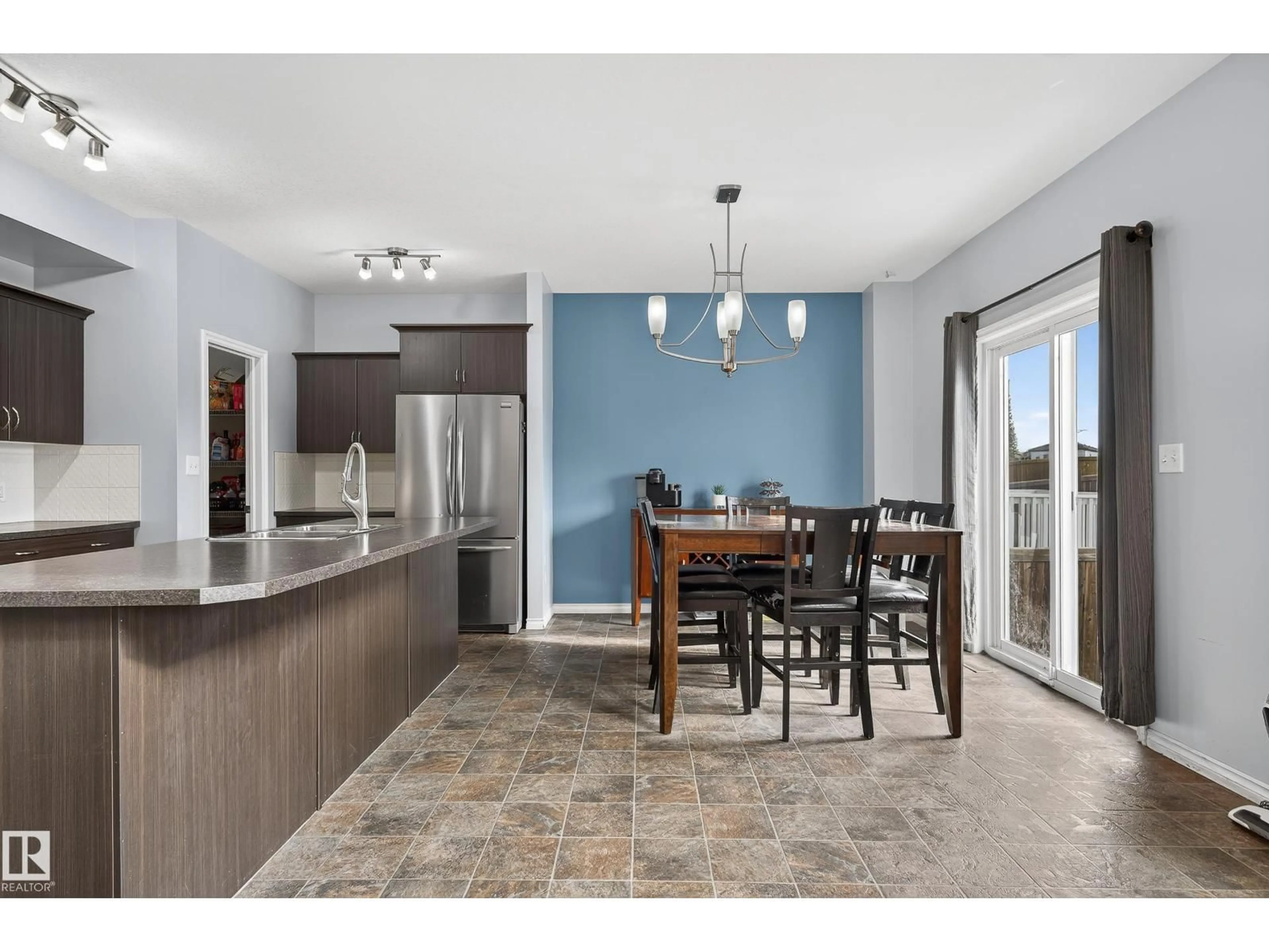 Open concept kitchen, ceramic/tile floor for 99 DALQUIST BA, Leduc Alberta T9E0J7
