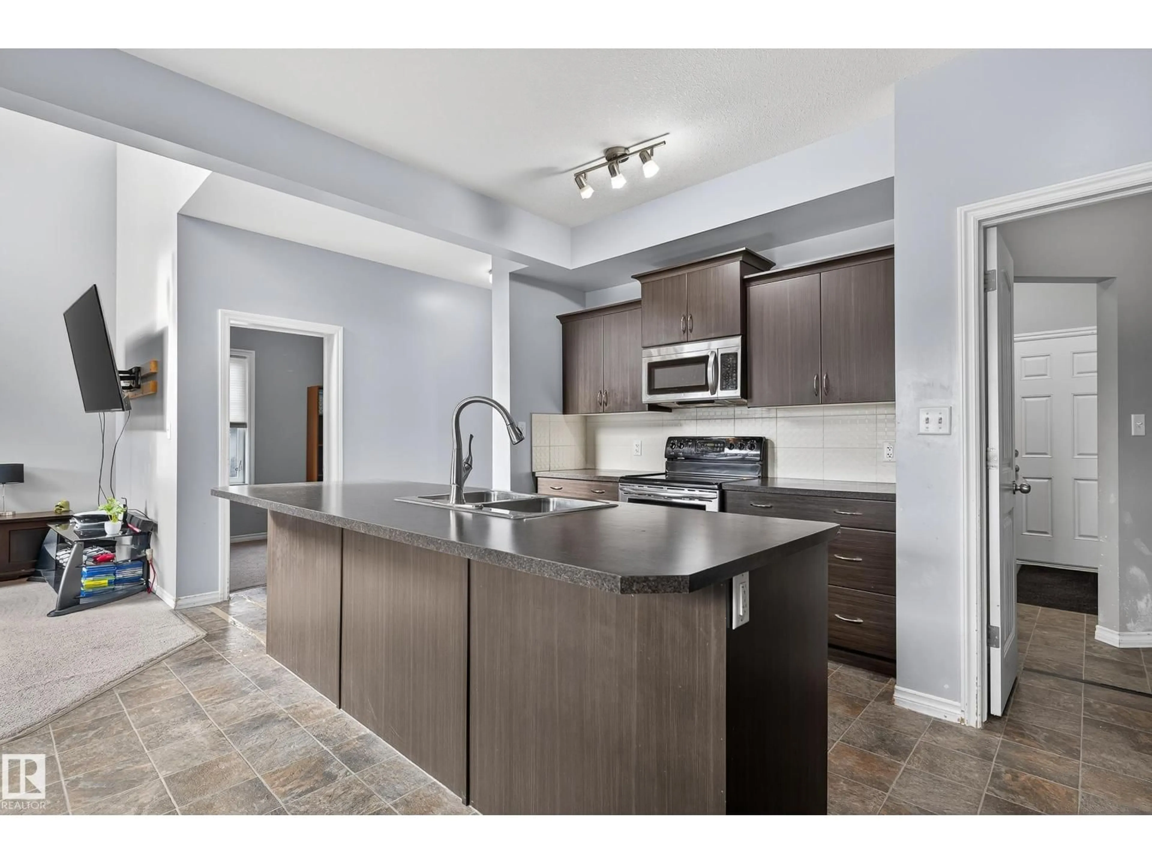Open concept kitchen, unknown for 99 DALQUIST BA, Leduc Alberta T9E0J7
