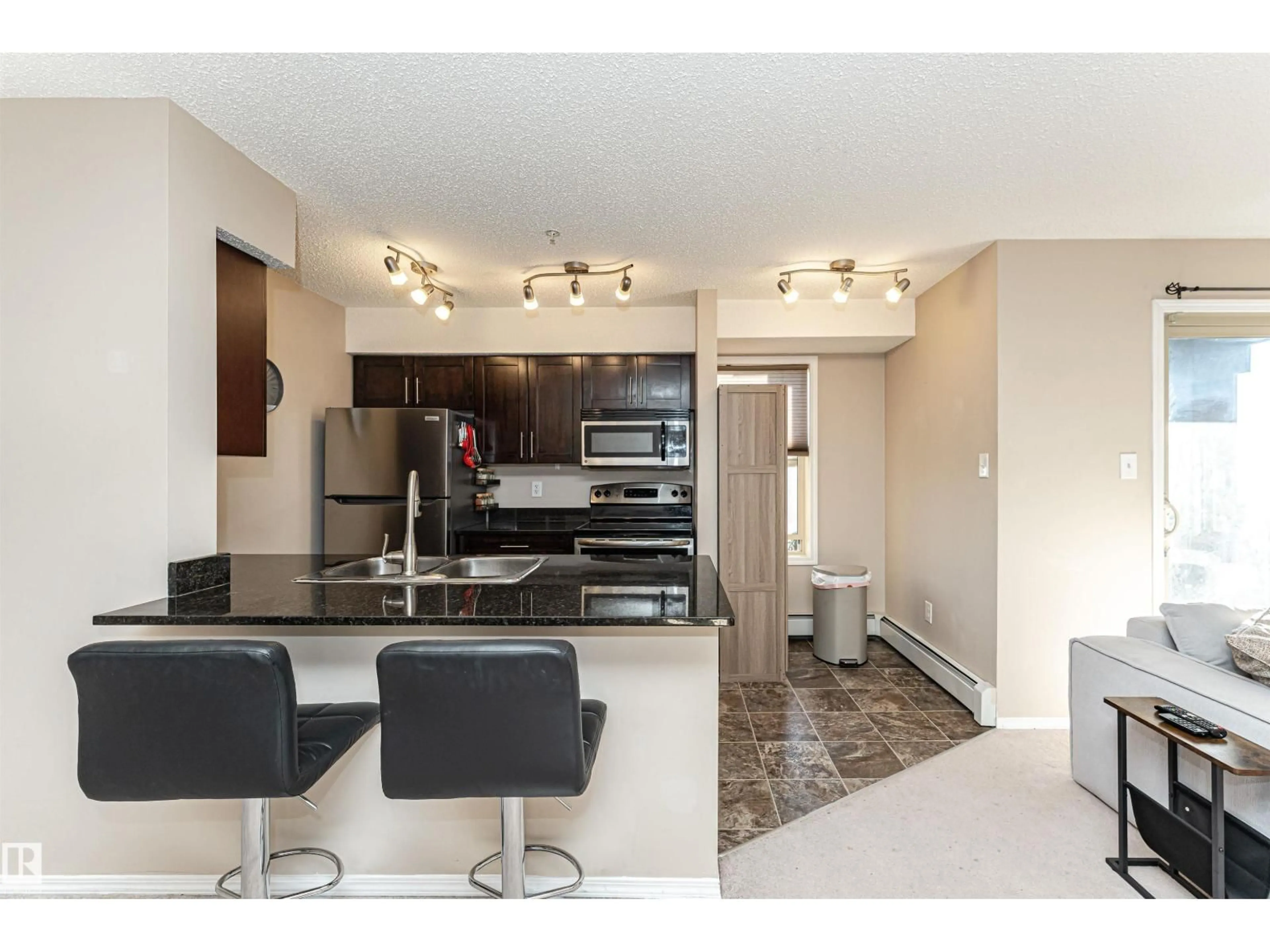 Open concept kitchen, unknown for 321 - 1070 MCCONACHIE BV, Edmonton Alberta T5Y0X1