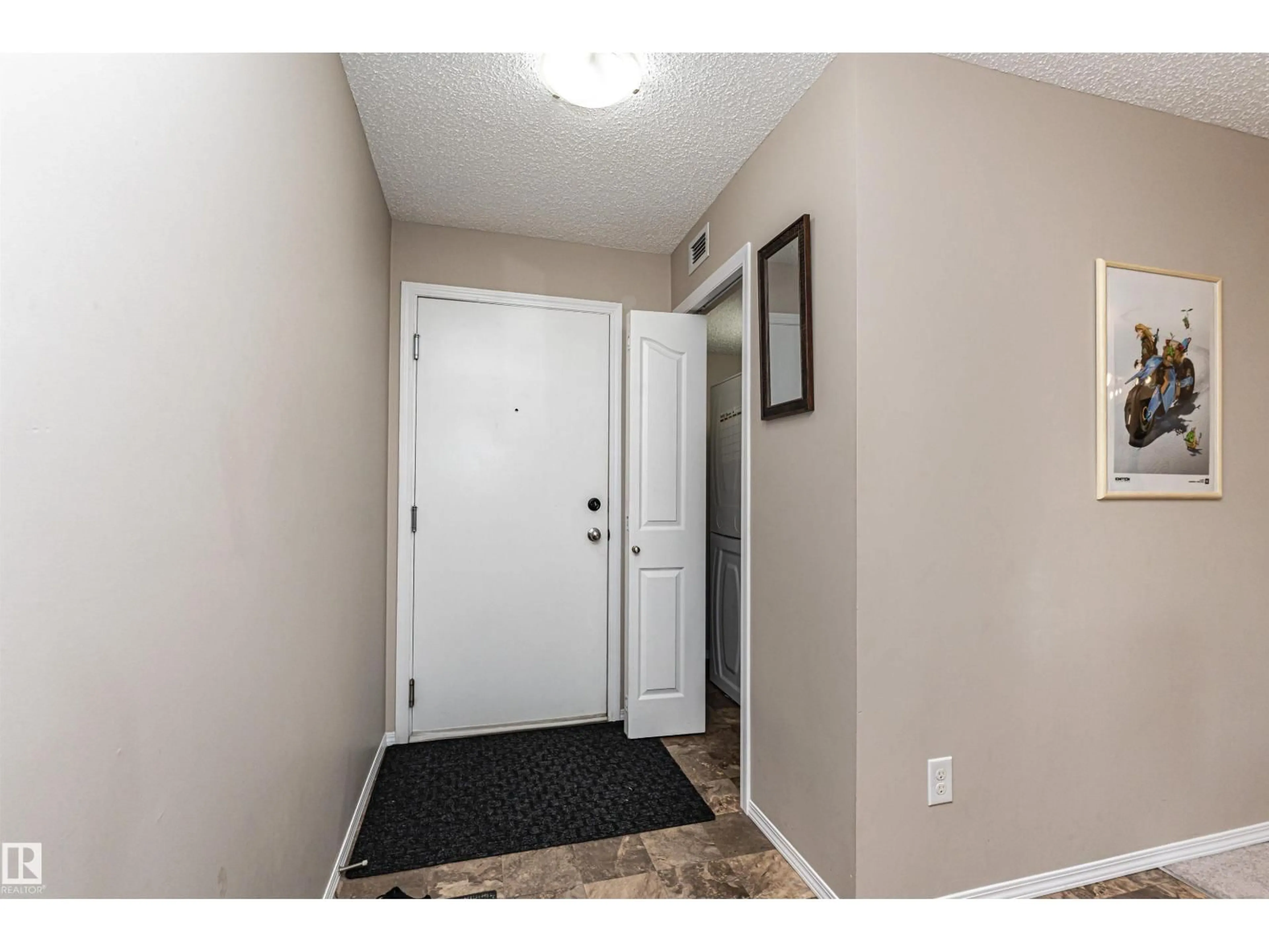 Indoor entryway for 321 - 1070 MCCONACHIE BV, Edmonton Alberta T5Y0X1