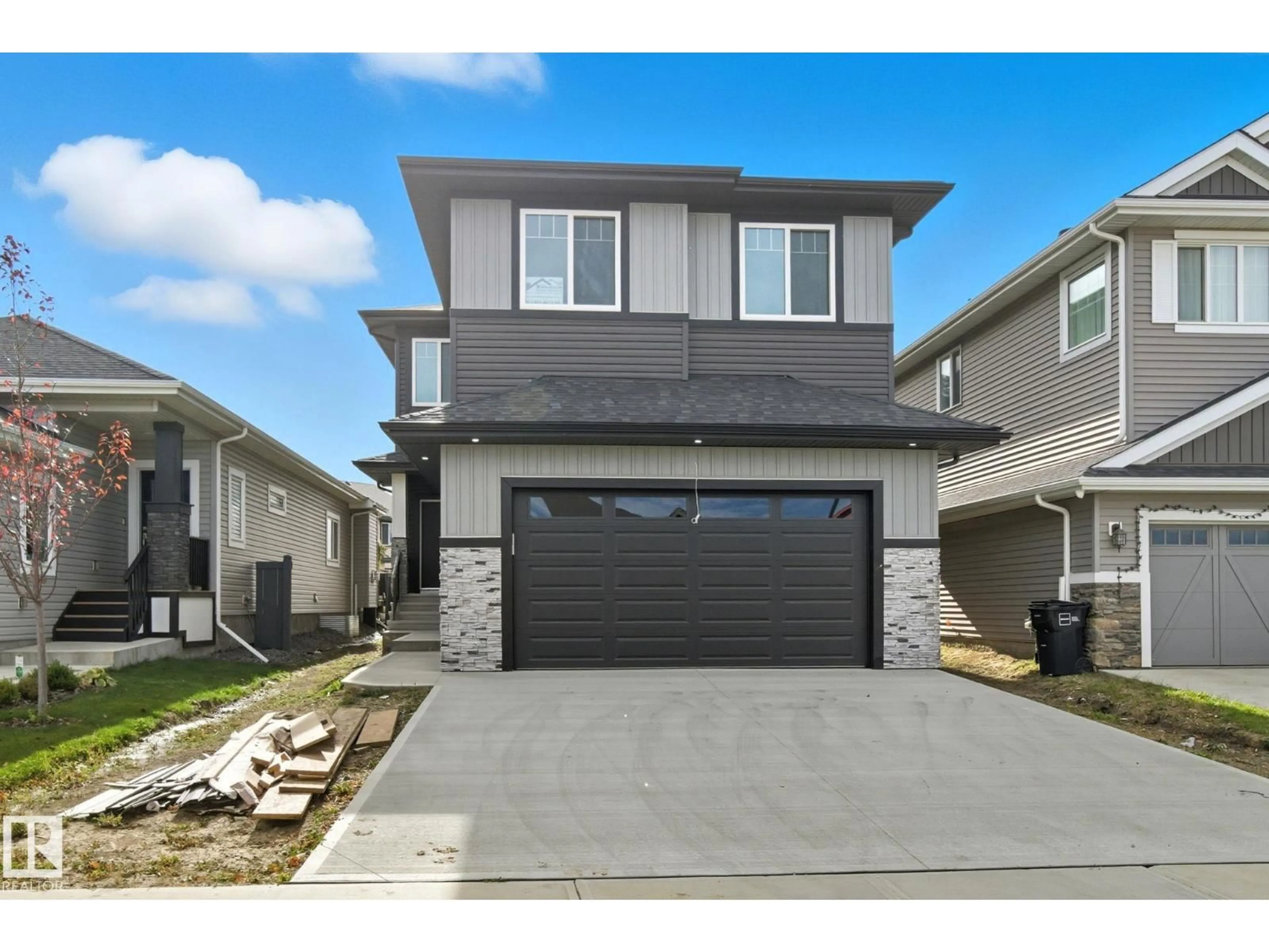 Home with vinyl exterior material, street for 8105 GOURLAY PL, Edmonton Alberta T7T5E9