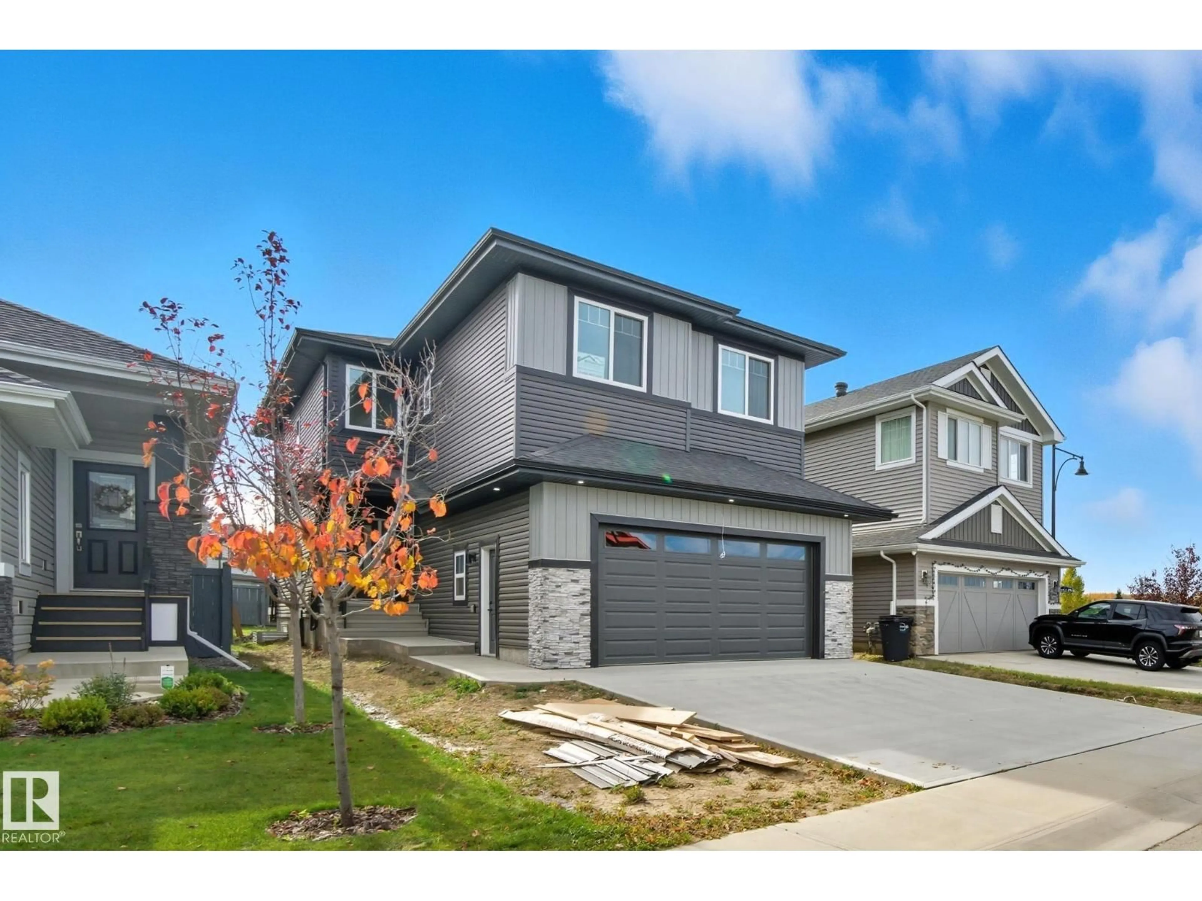 Home with vinyl exterior material, street for 8105 GOURLAY PL, Edmonton Alberta T7T5E9
