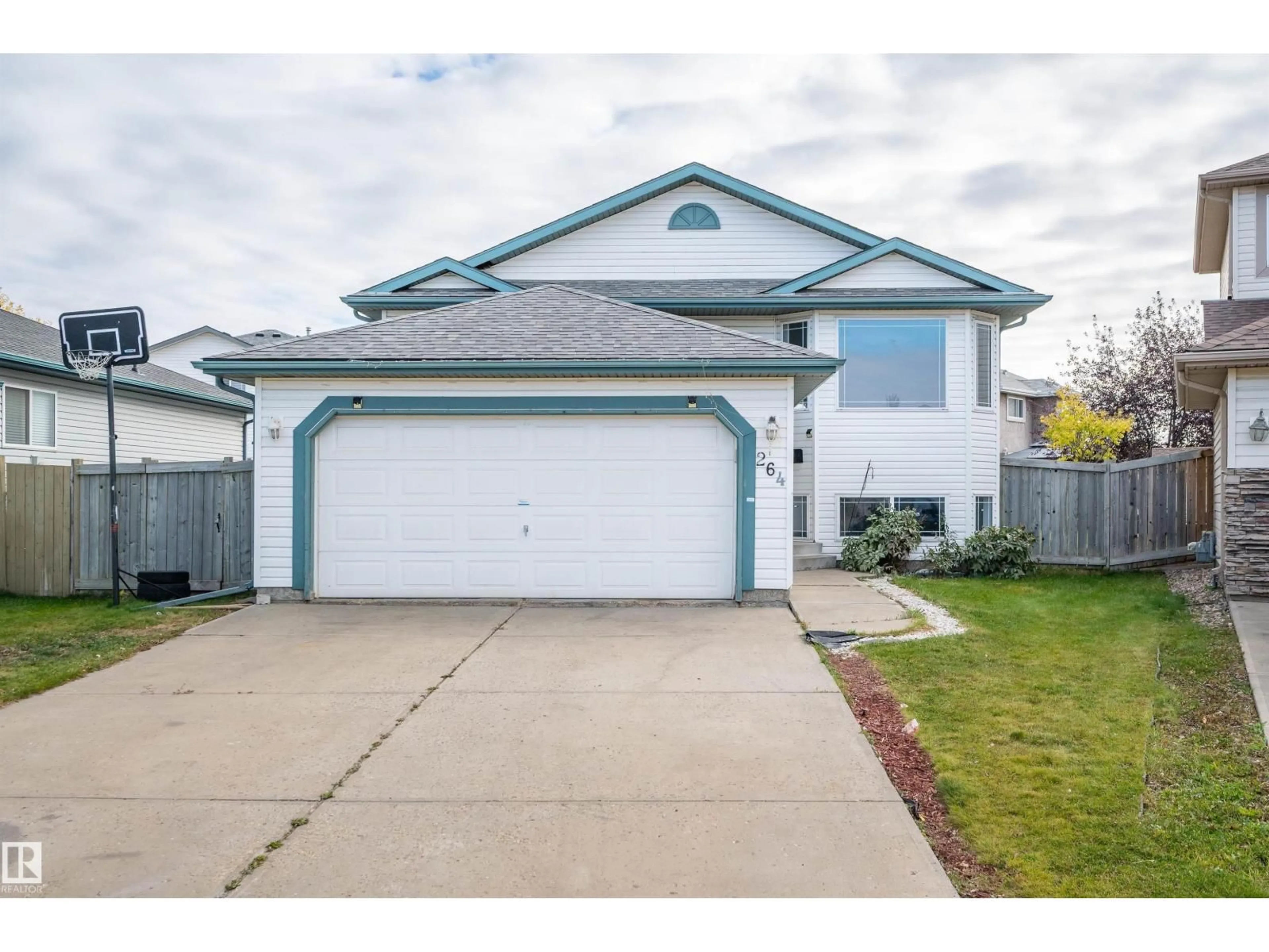 Home with vinyl exterior material, street for 264 DUNVEGAN RD, Edmonton Alberta T5L5E5