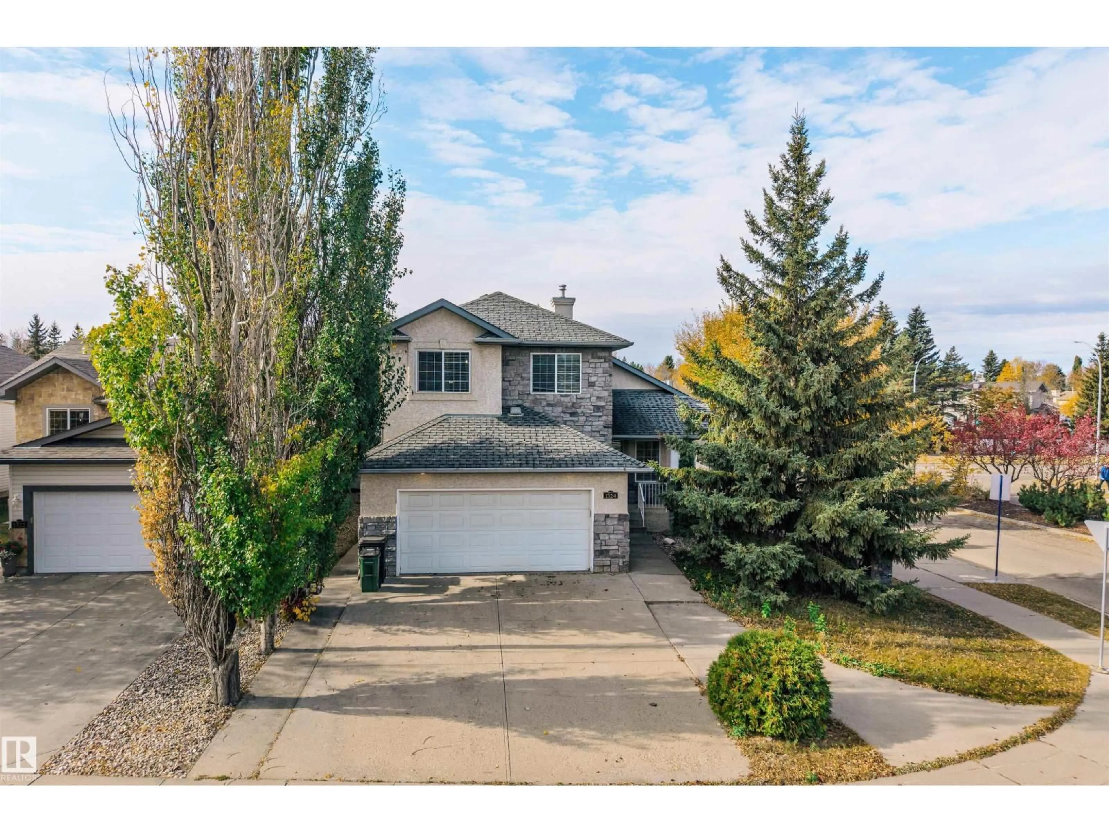 Home with vinyl exterior material, street for 1324 FALCONER RD, Edmonton Alberta T6R2V5