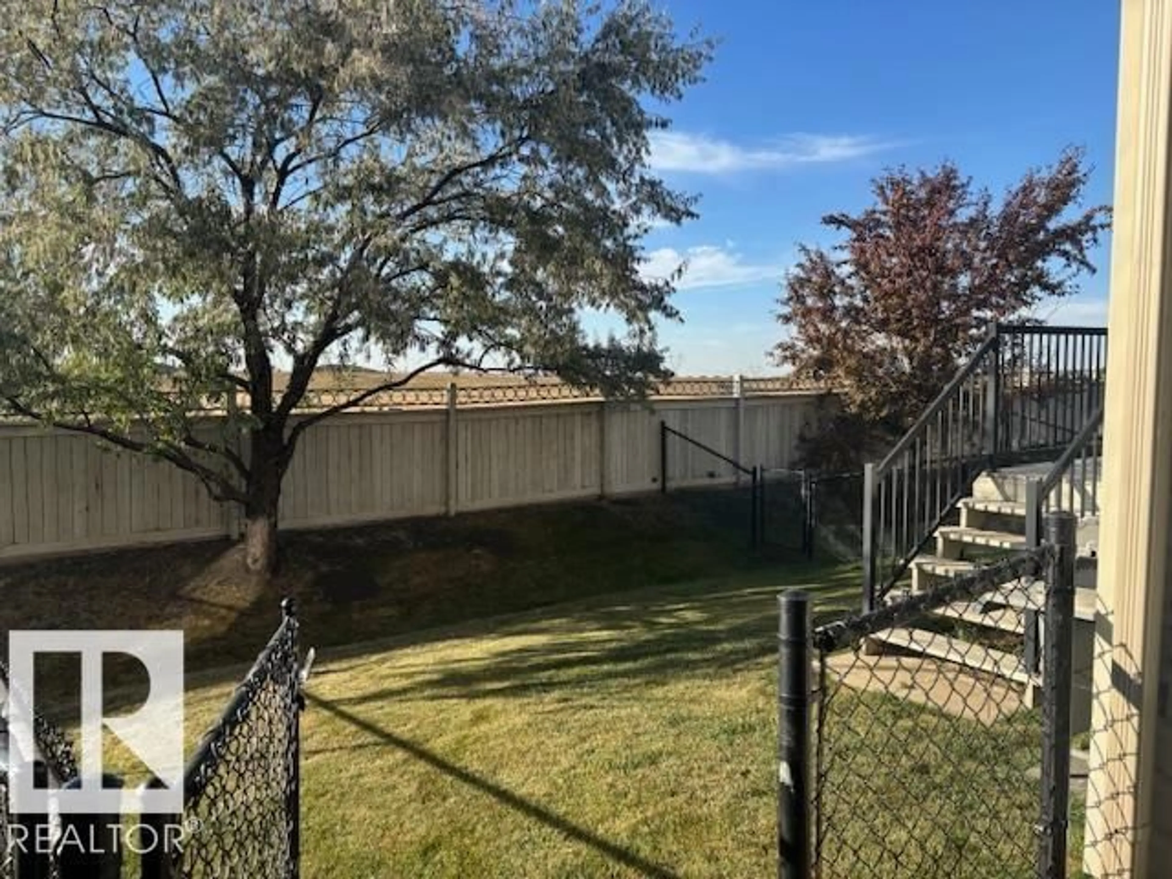 A pic from outside/outdoor area/front of a property/back of a property/a pic from drone, mountain view for #33 - 1128 156 ST, Edmonton Alberta T6R0C9