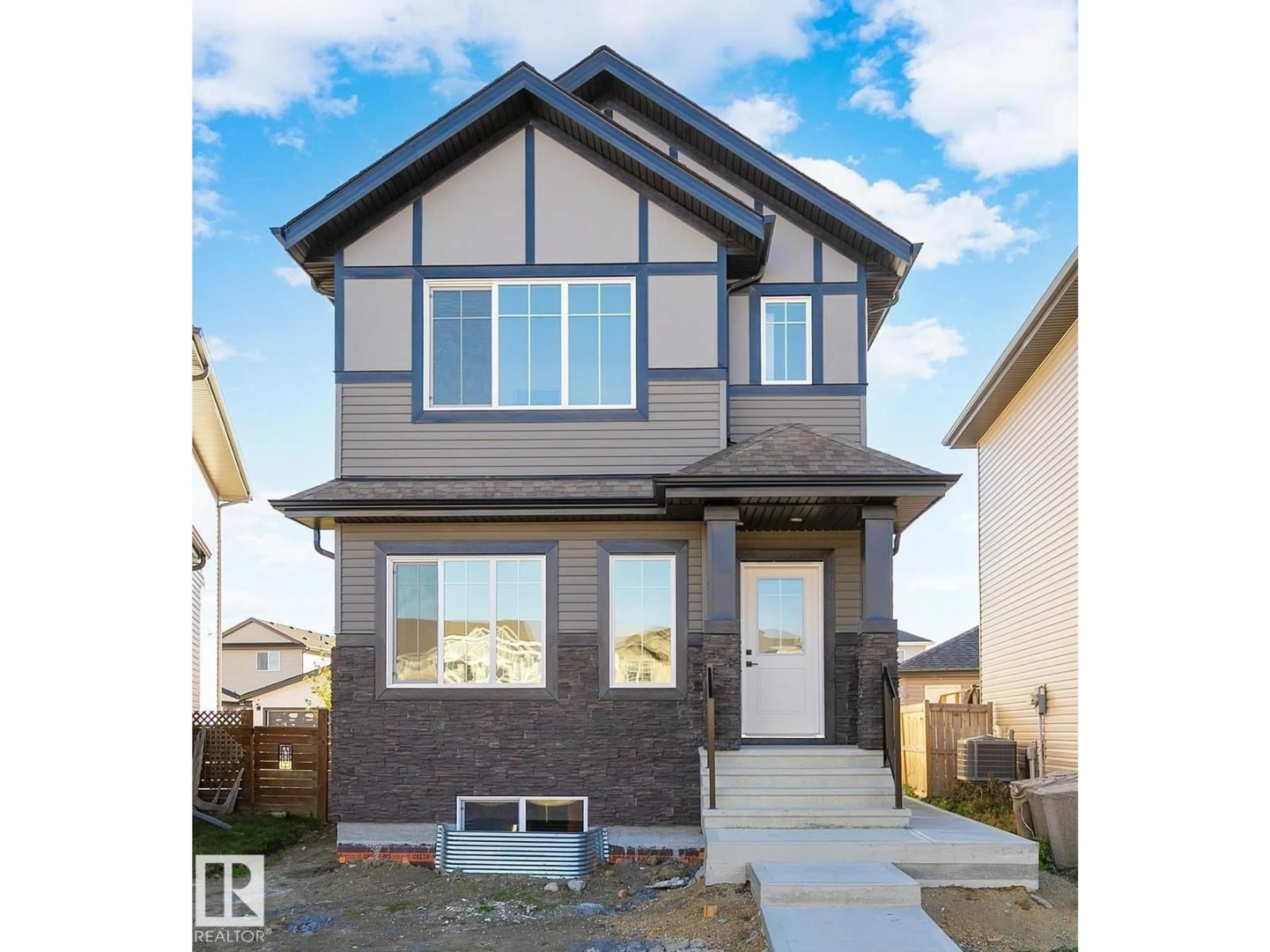 Home with vinyl exterior material, street for 10617 99 ST, Morinville Alberta T8R2P1