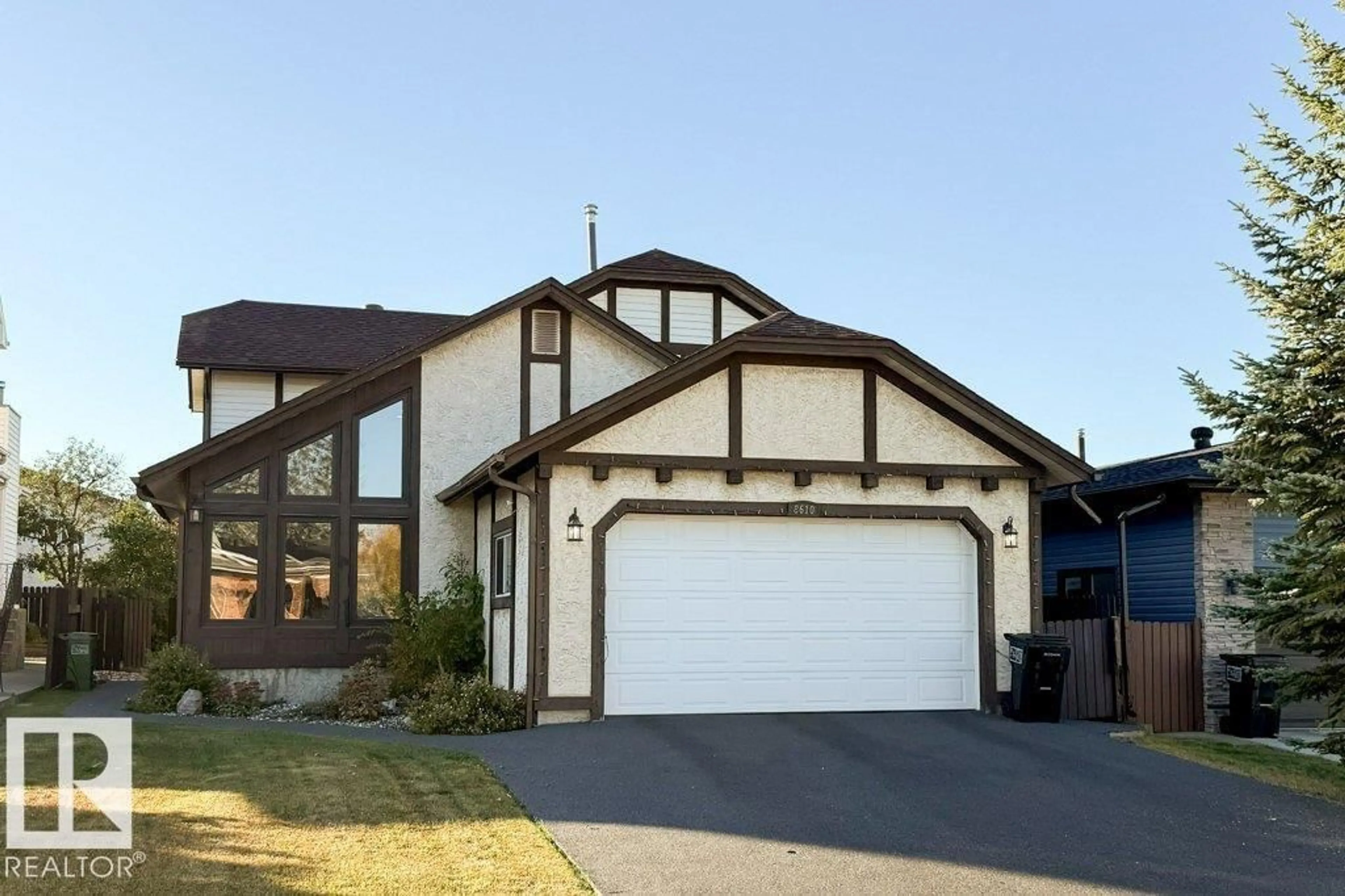 Home with vinyl exterior material, street for NW - 8610 152B AV, Edmonton Alberta T5E6H2