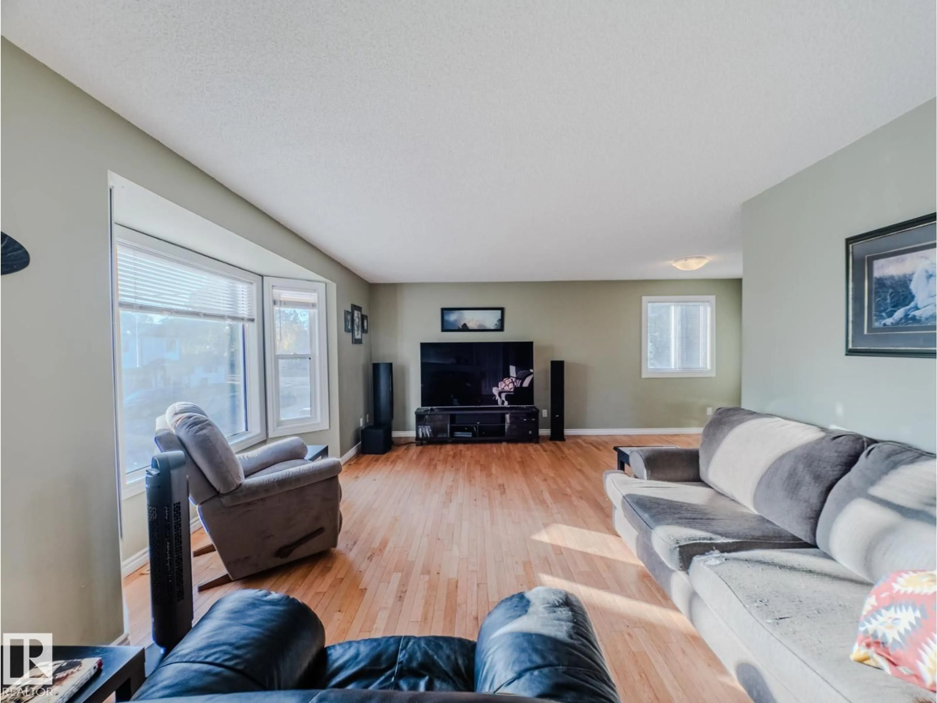 Living room with furniture, unknown for NW - 11410 46 ST, Edmonton Alberta T5W5E4