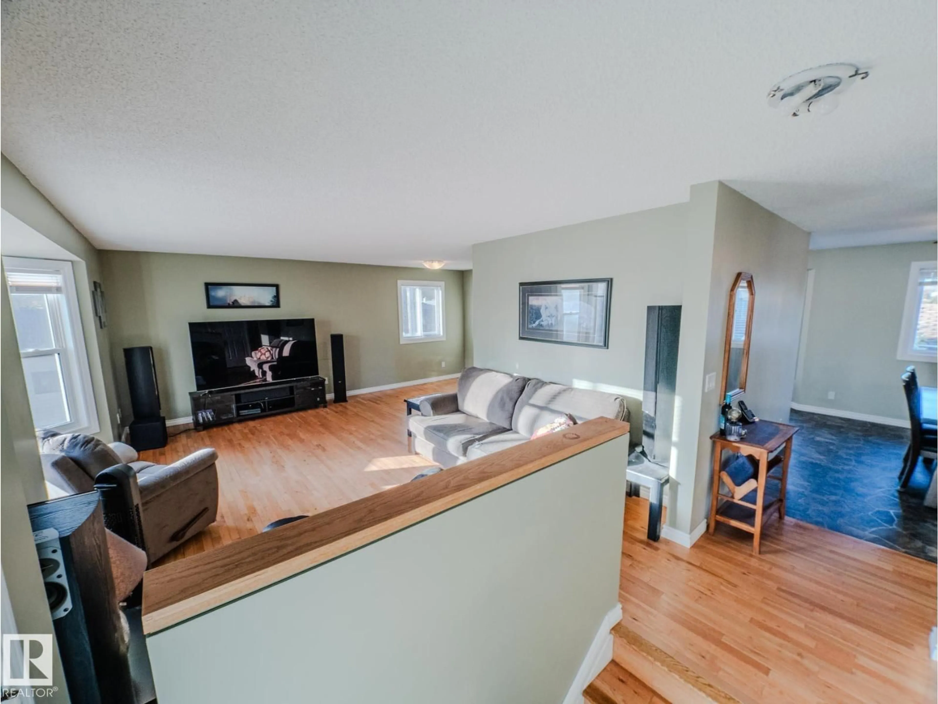 Living room with furniture, unknown for NW - 11410 46 ST, Edmonton Alberta T5W5E4
