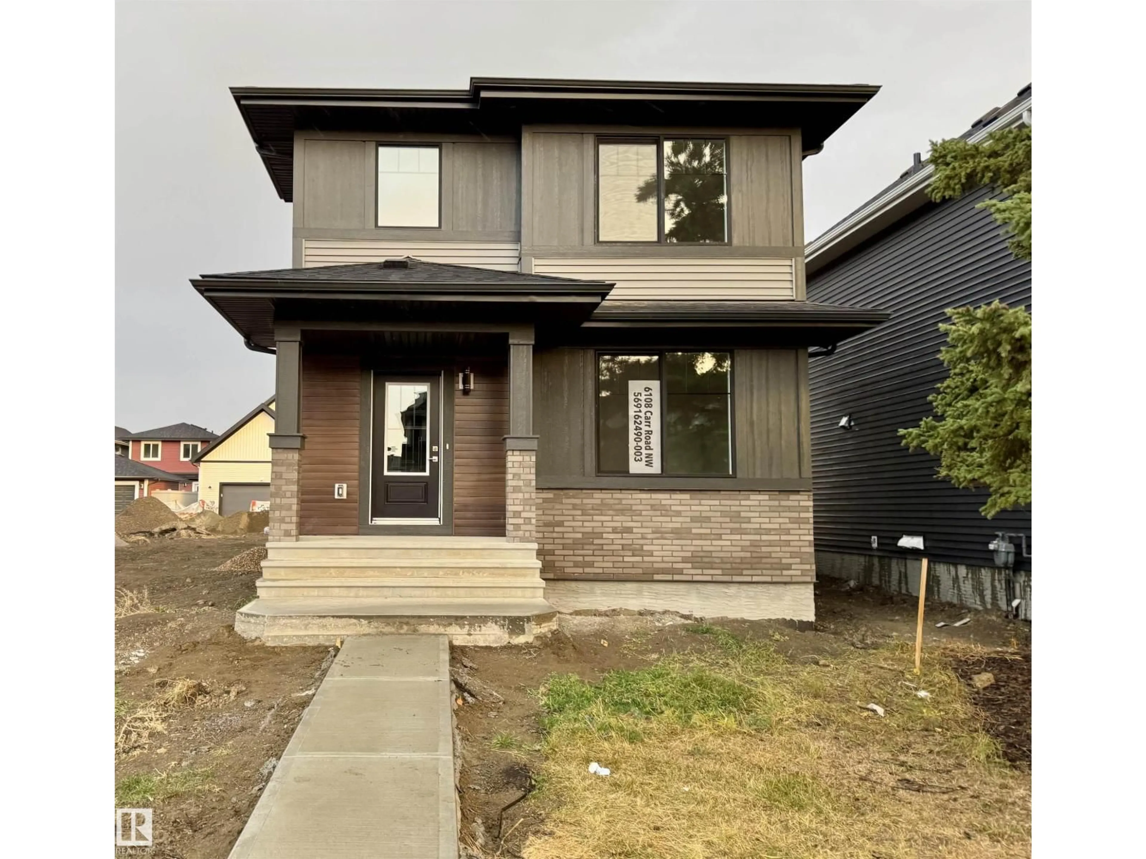 Home with brick exterior material, street for 6108 CARR RD, Edmonton Alberta T5E6Y4