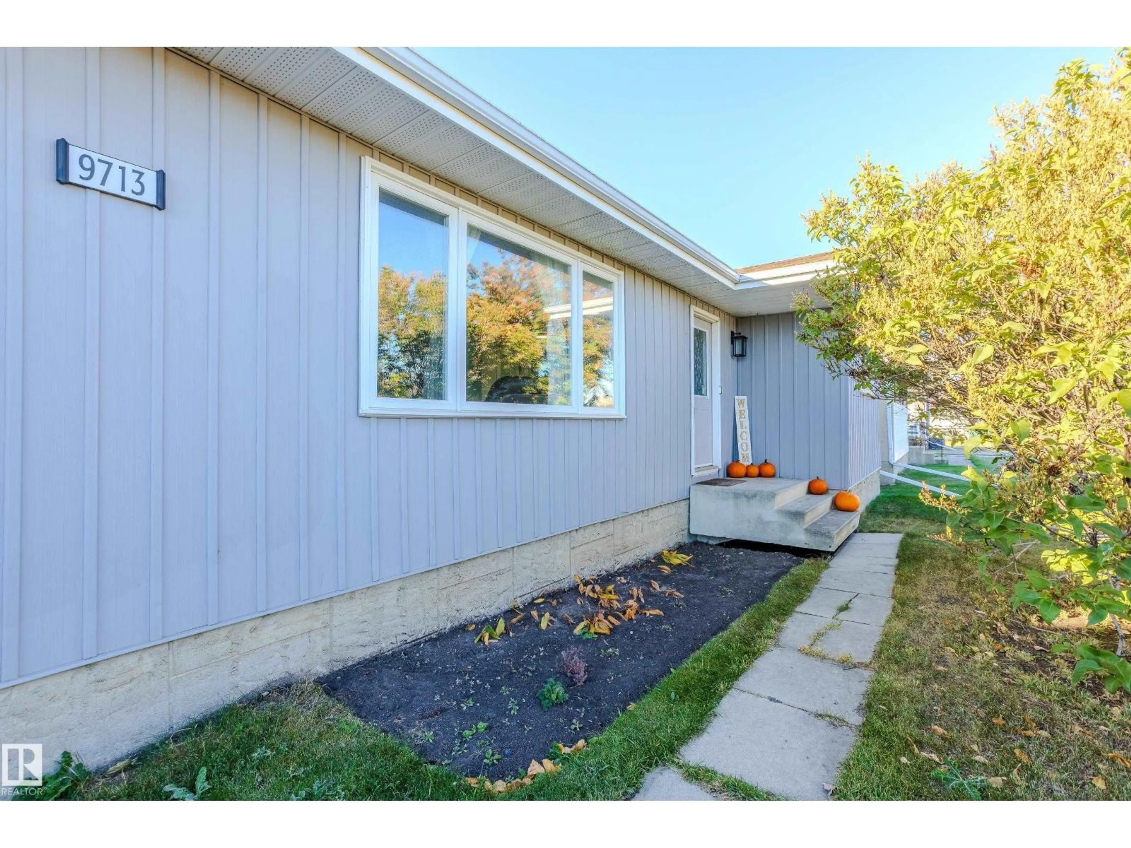 Home with vinyl exterior material, street for 9713 100 AV, Morinville Alberta T8R1G6