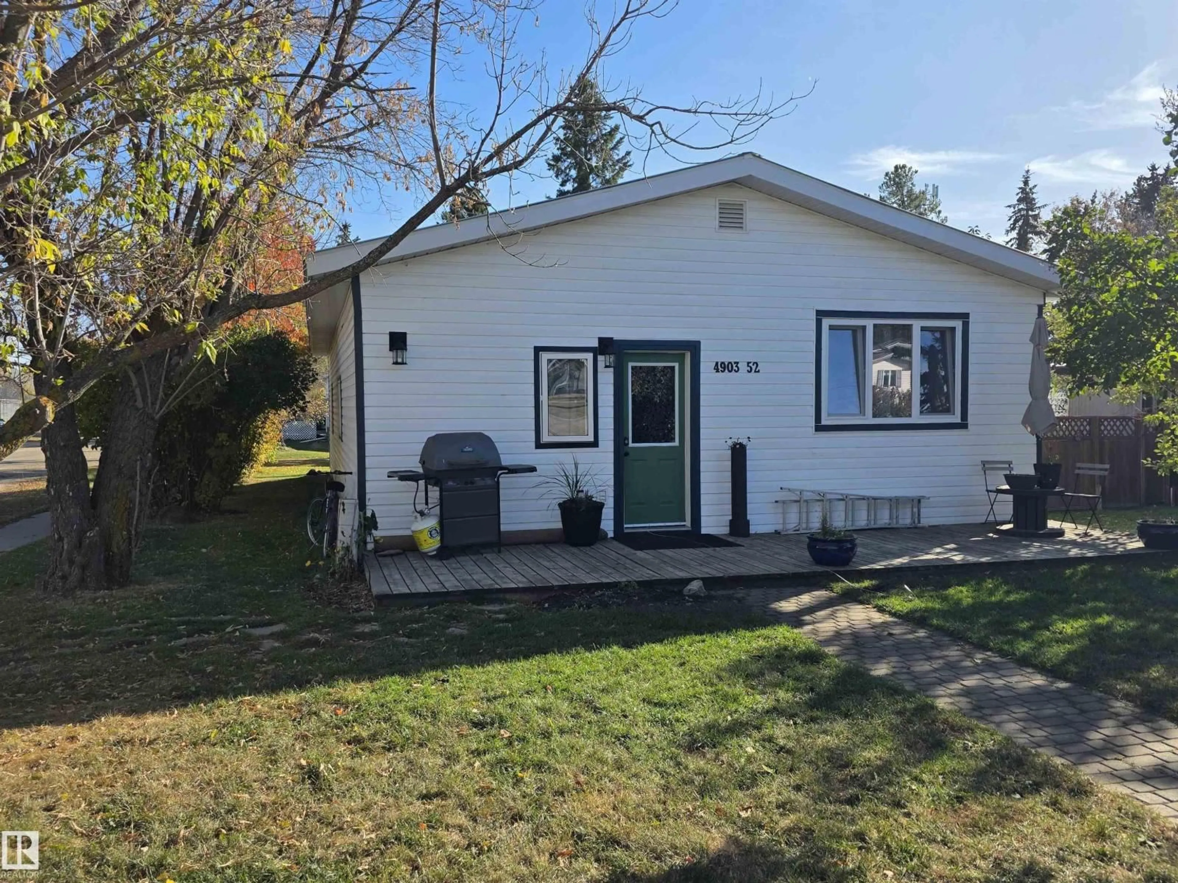 Home with vinyl exterior material, street for 4903 52 AV, Breton Alberta T0C0P0