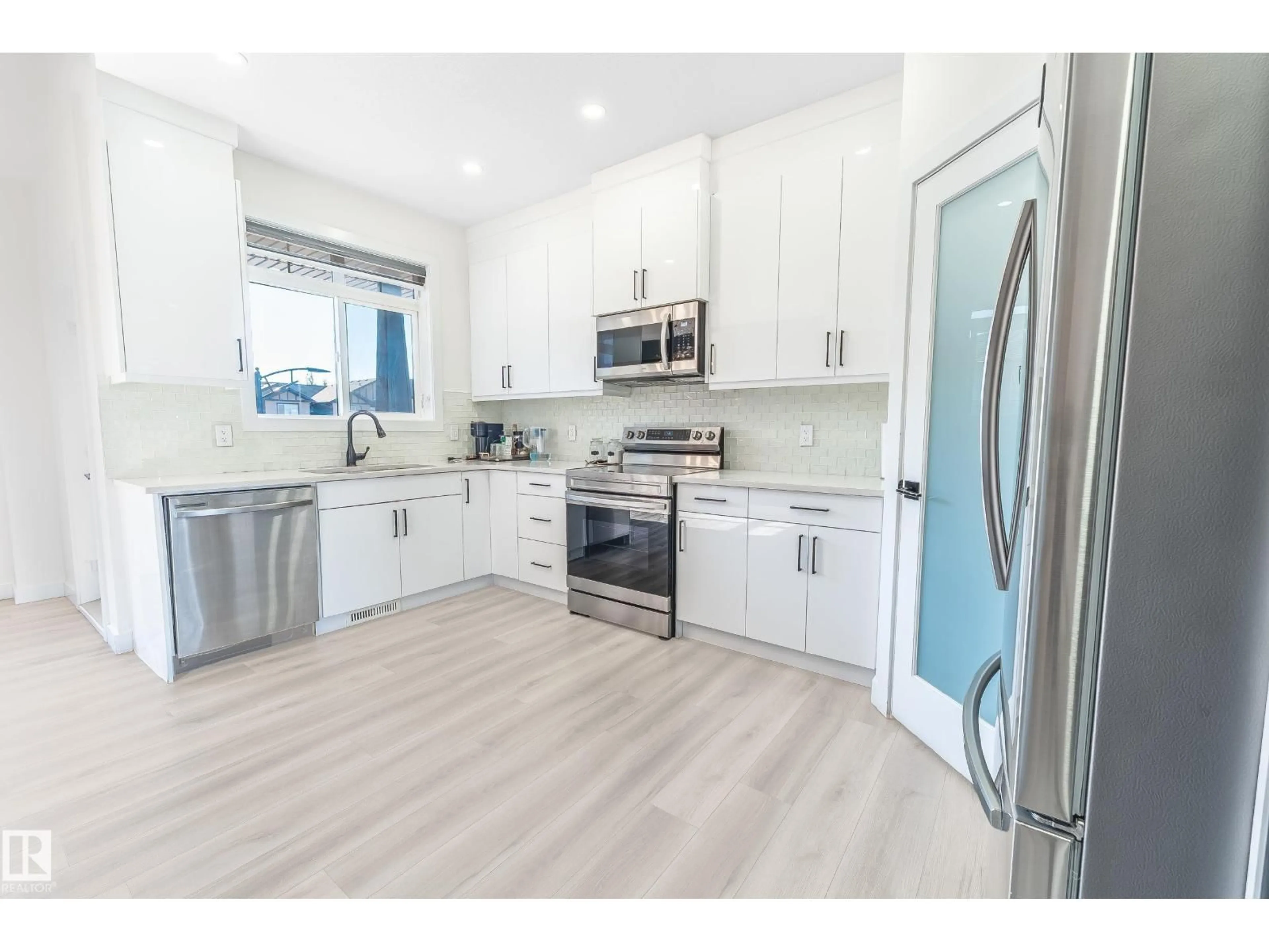 Open concept kitchen, unknown for 19 - 1703 16 AV NW, Edmonton Alberta T6T2C3
