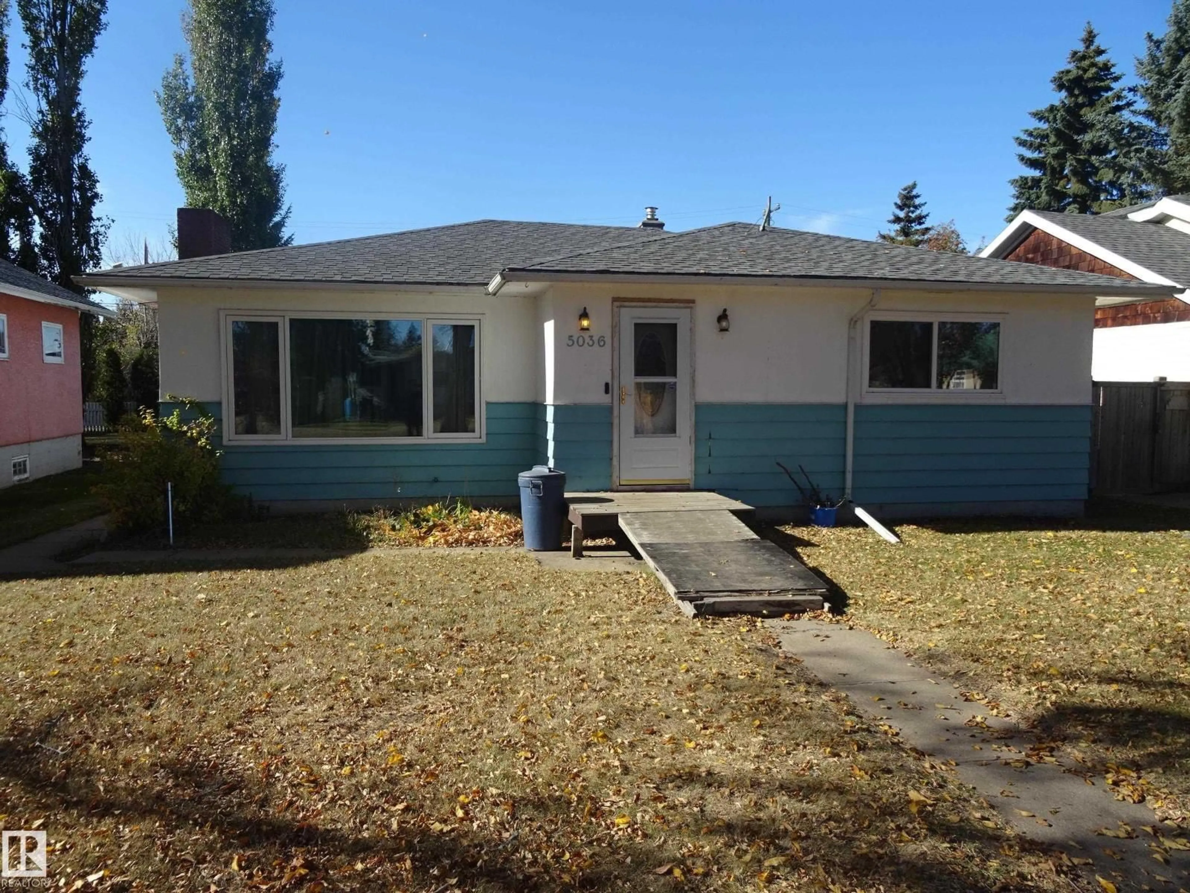 Home with vinyl exterior material, street for 5036 52 ST, Andrew Alberta T0B0C0
