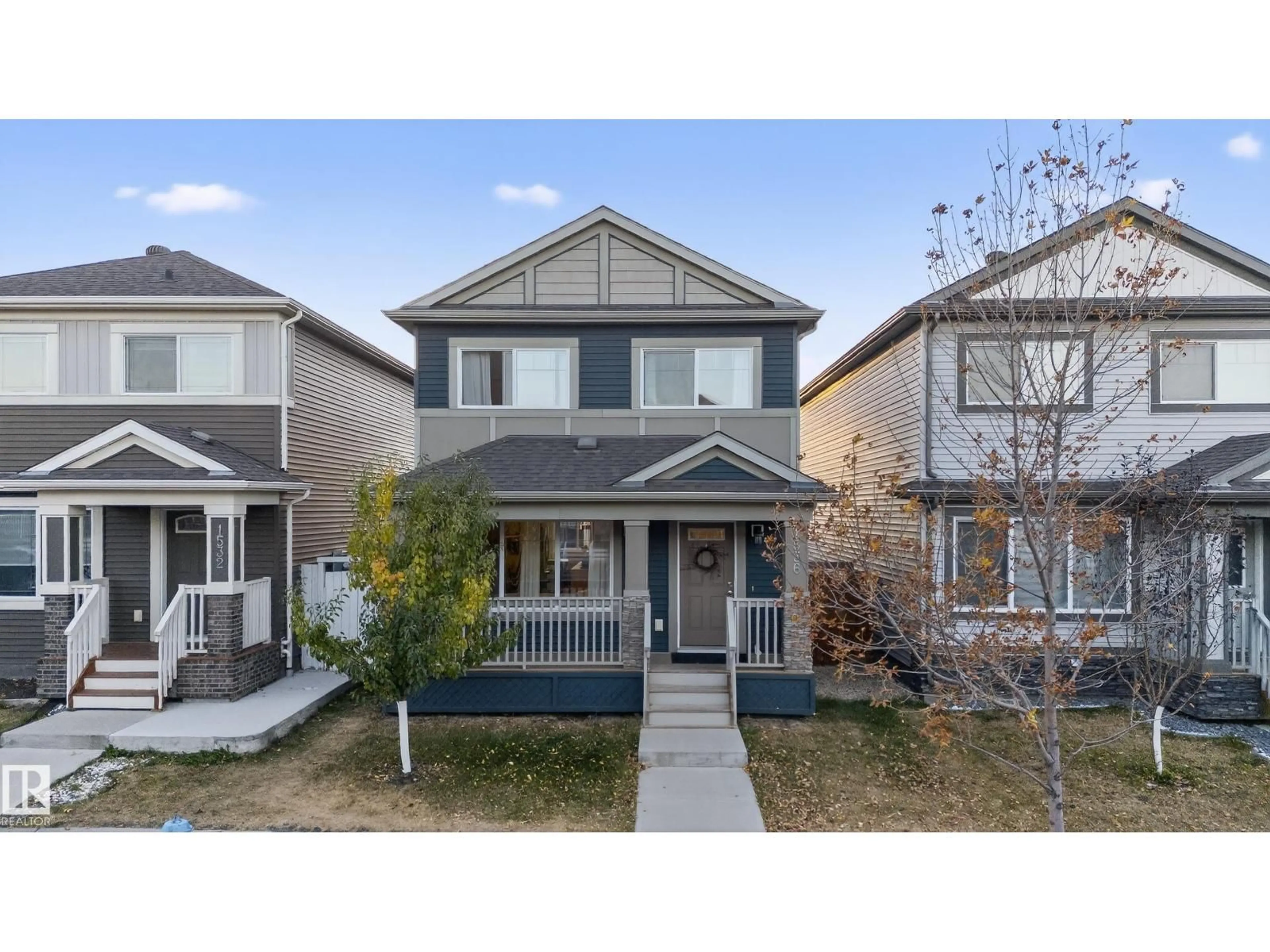 Home with vinyl exterior material, street for NW - 1536 22 ST, Edmonton Alberta T6T2B8