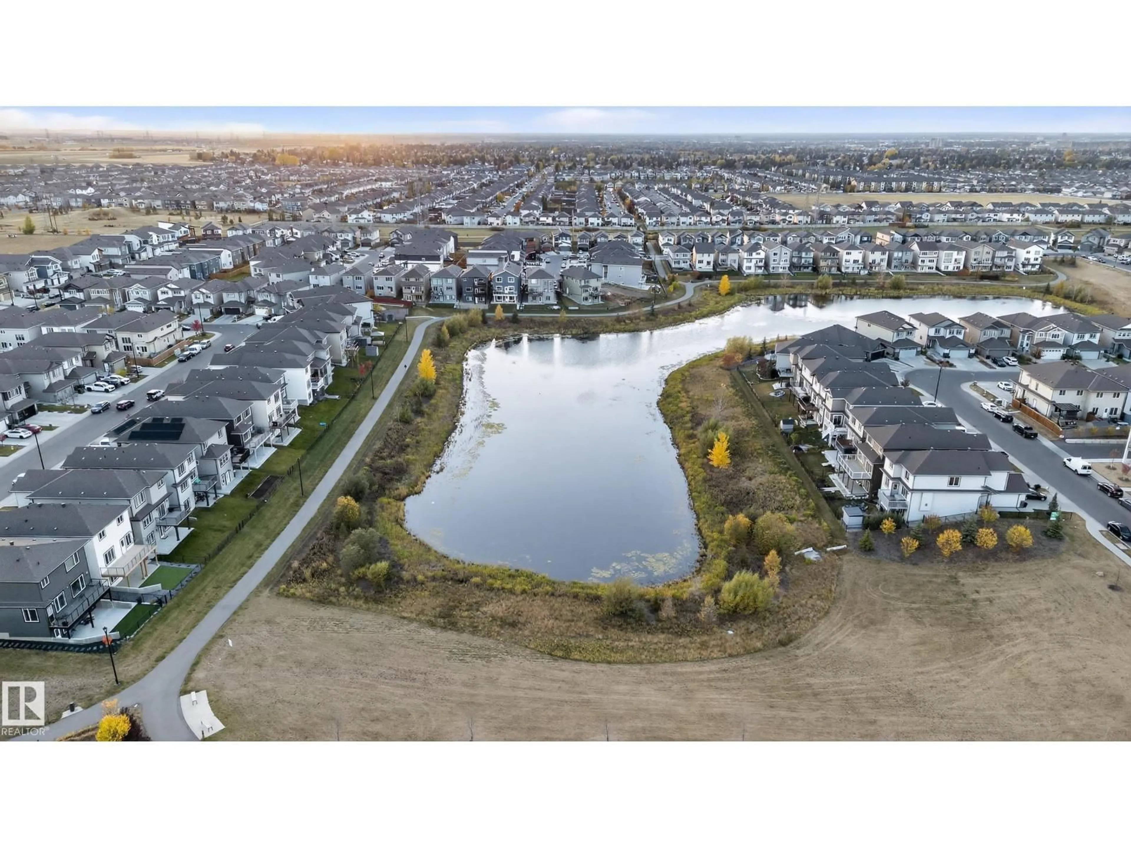 A pic from outside/outdoor area/front of a property/back of a property/a pic from drone, water/lake/river/ocean view for NW - 1536 22 ST, Edmonton Alberta T6T2B8