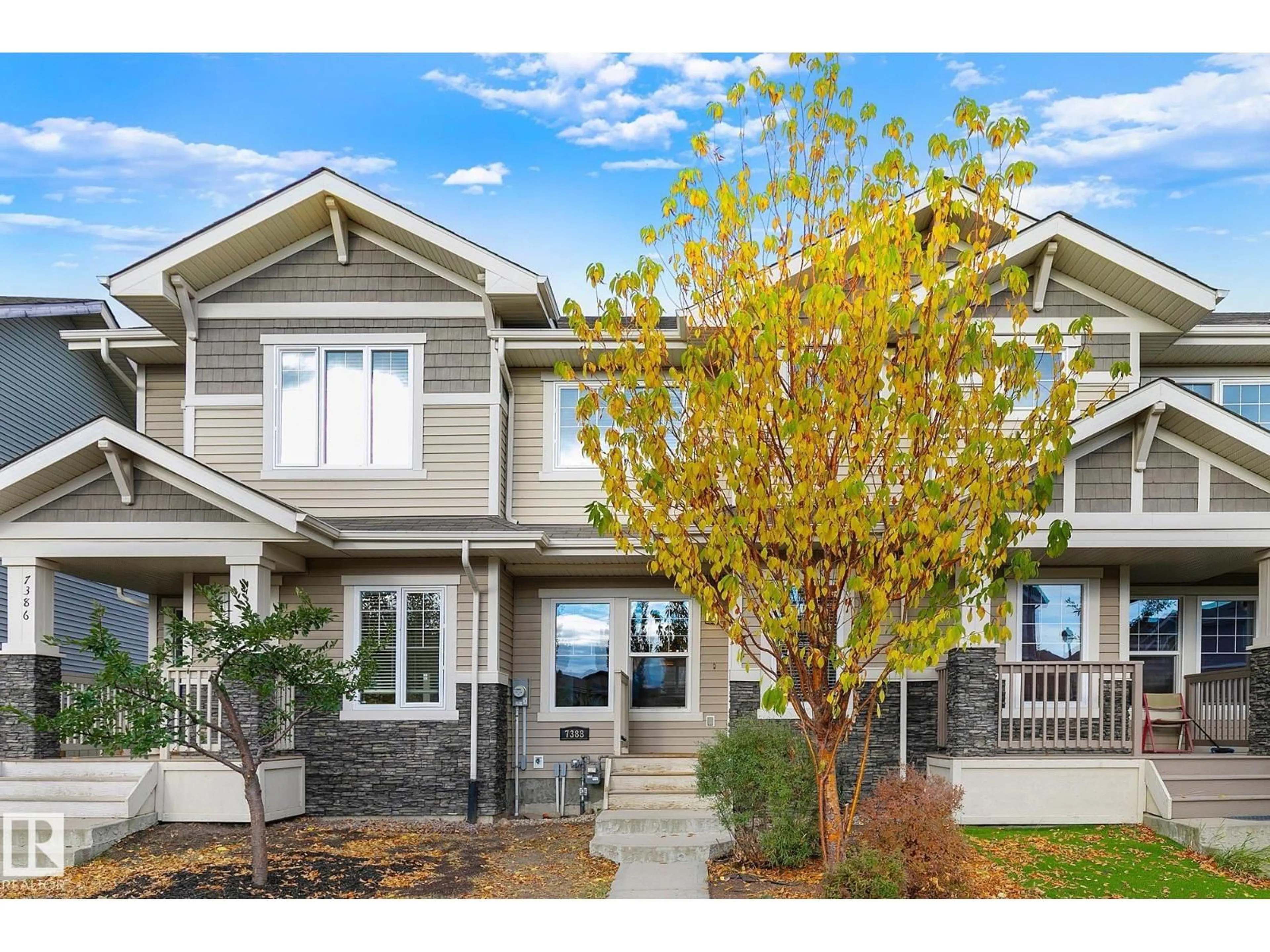 Home with vinyl exterior material, street for 7388 EDGEMONT WY, Edmonton Alberta T6M0P4