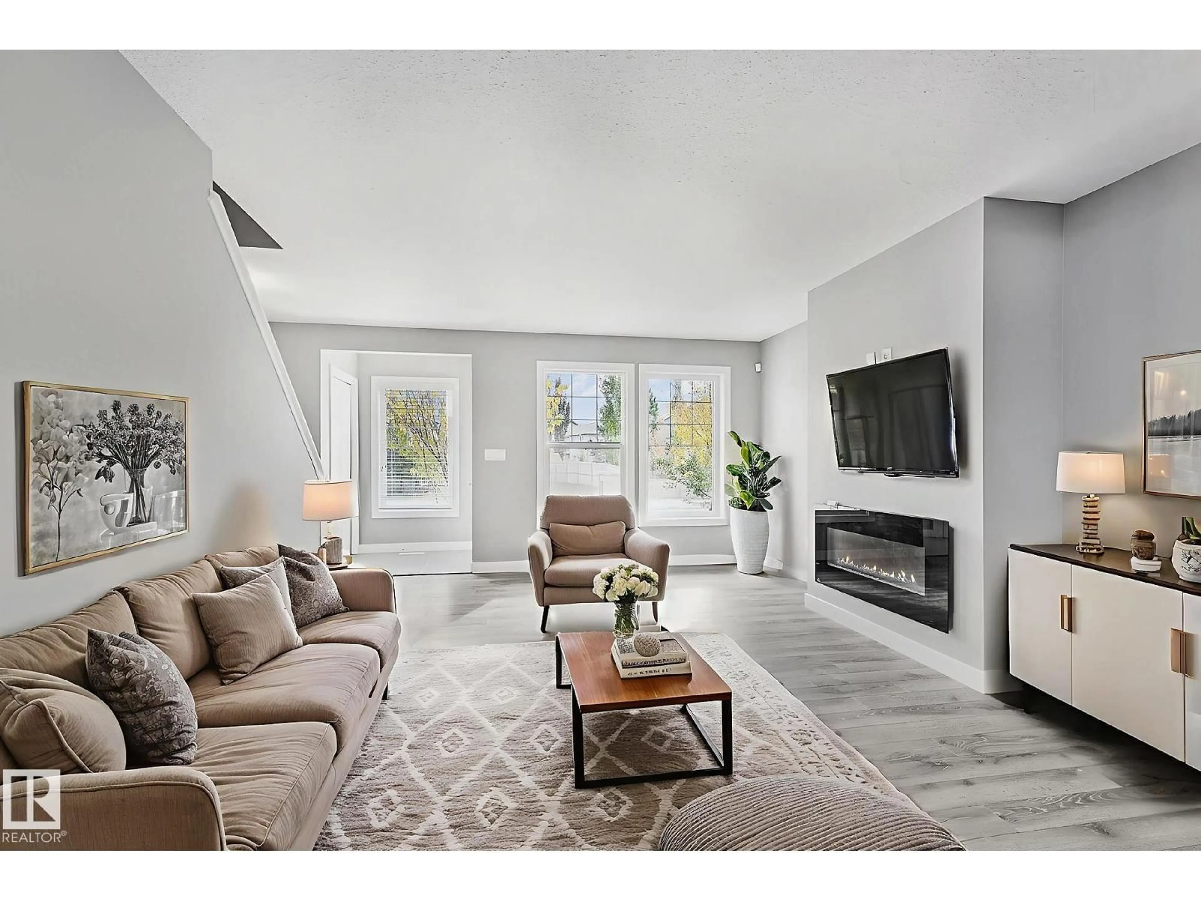 Living room with furniture, unknown for 7388 EDGEMONT WY, Edmonton Alberta T6M0P4