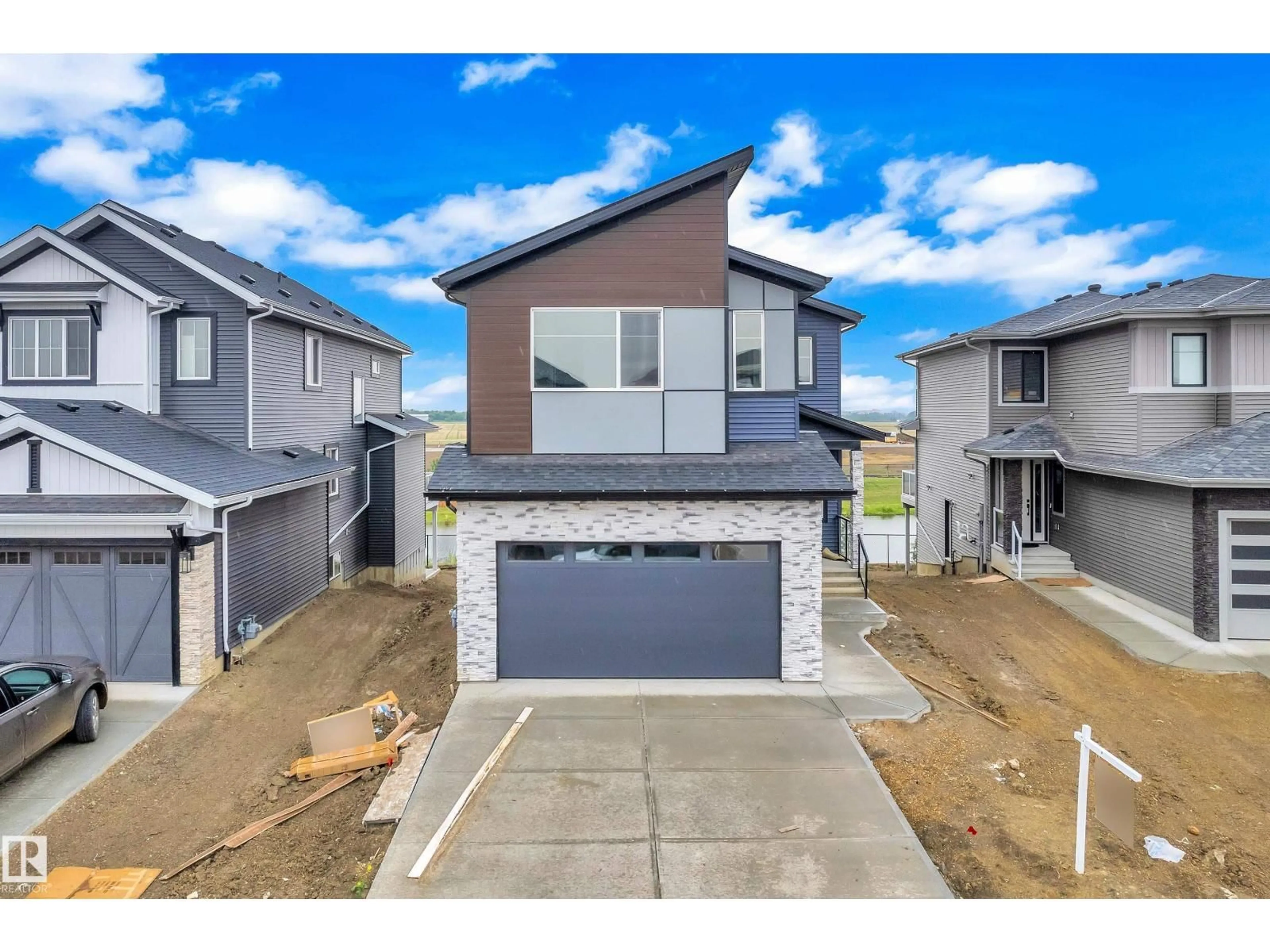 A pic from outside/outdoor area/front of a property/back of a property/a pic from drone, street for 2641 63 AV, Rural Leduc County Alberta T4X3A6
