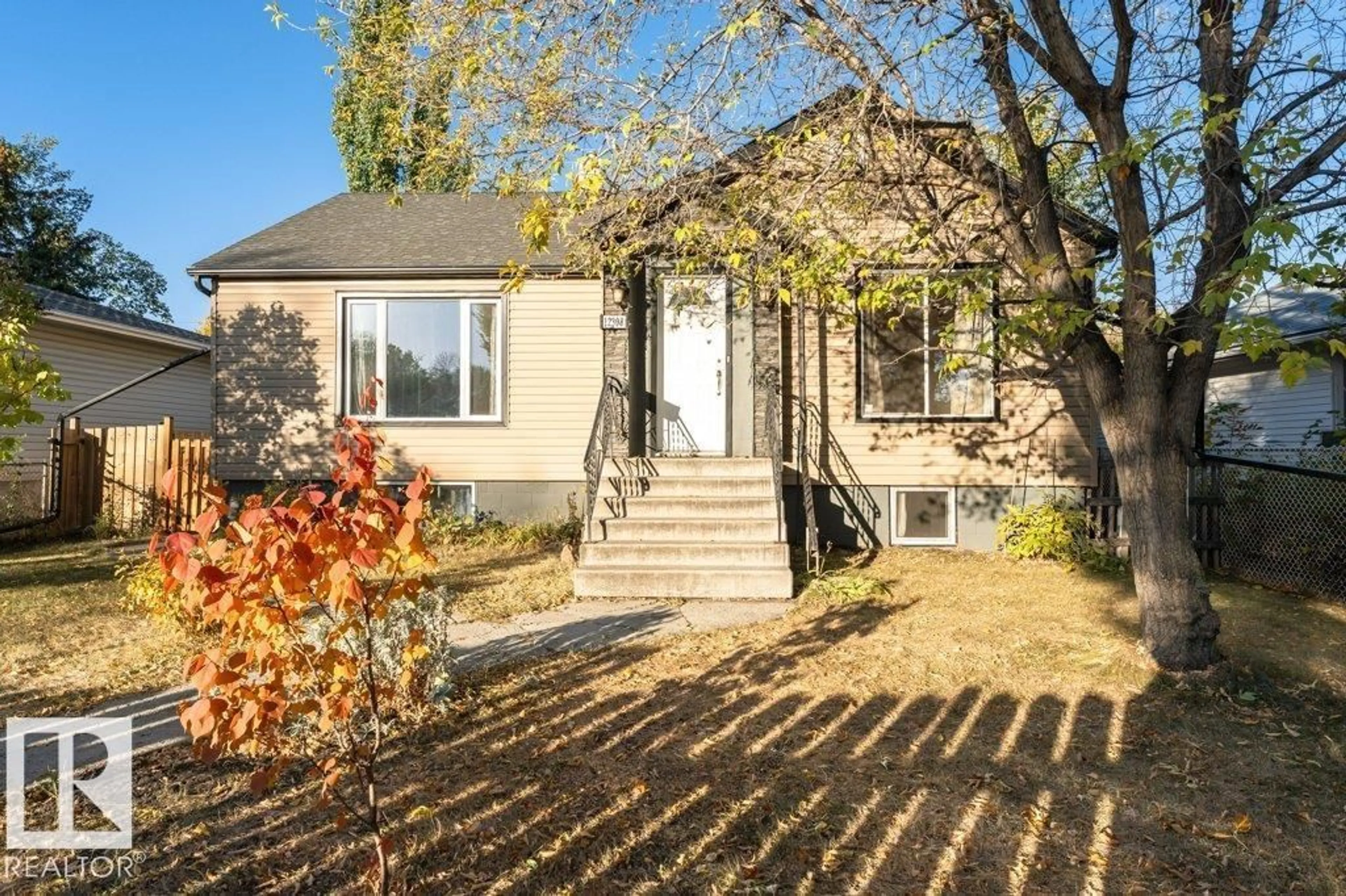 Home with vinyl exterior material, street for NW - 12308 86 ST, Edmonton Alberta T5B3L2