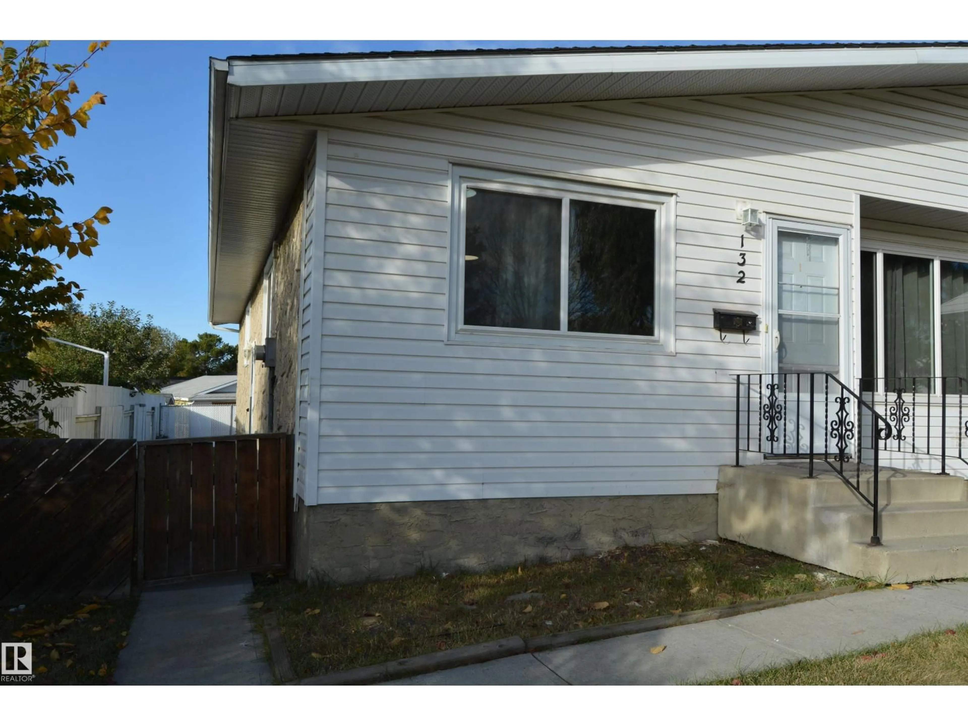 Home with vinyl exterior material, street for 132 MILLBOURNE RD E, Edmonton Alberta T6K0K9