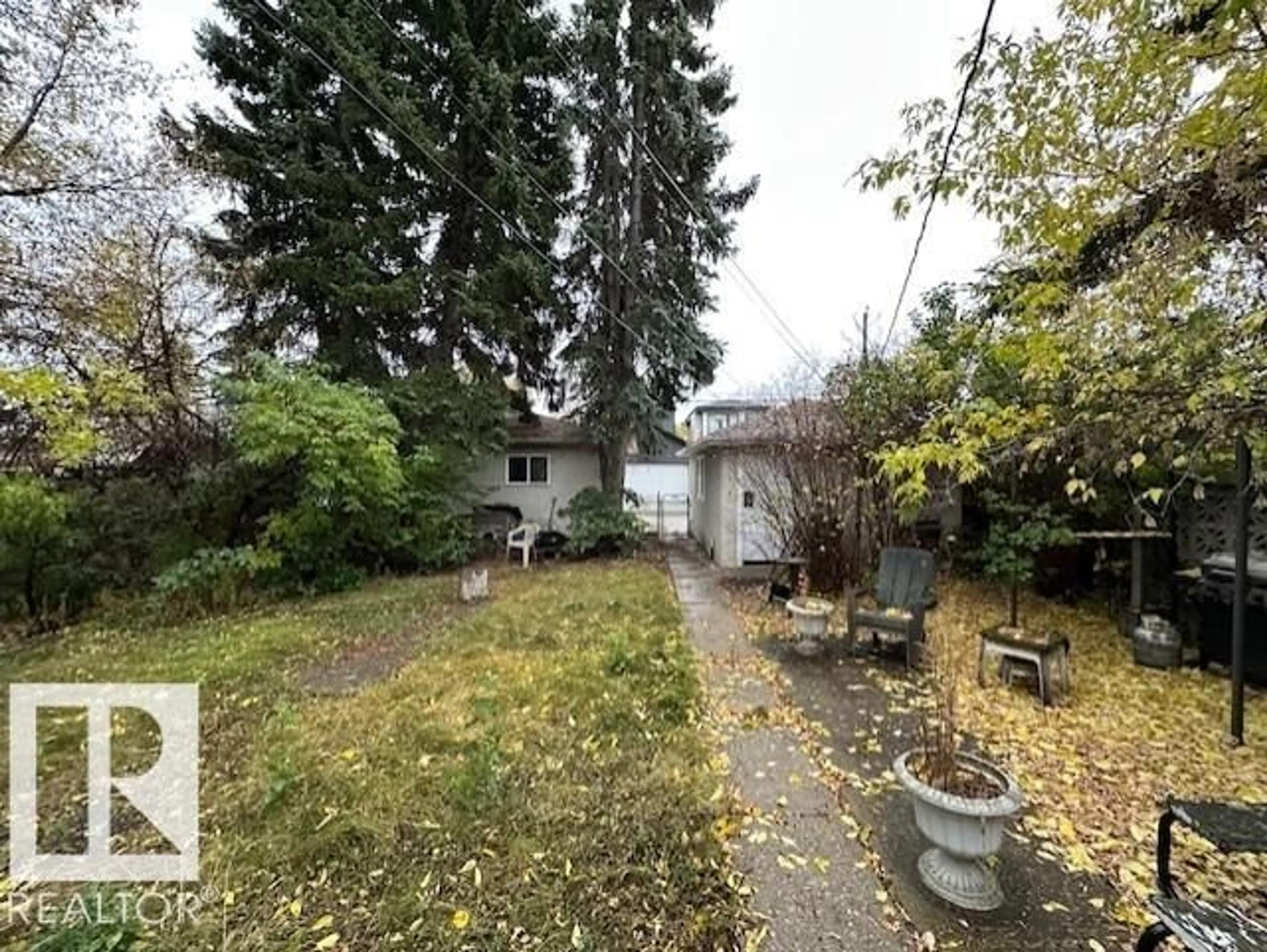 A pic from outside/outdoor area/front of a property/back of a property/a pic from drone, unknown for 9119 74 AV, Edmonton Alberta T6E1C9