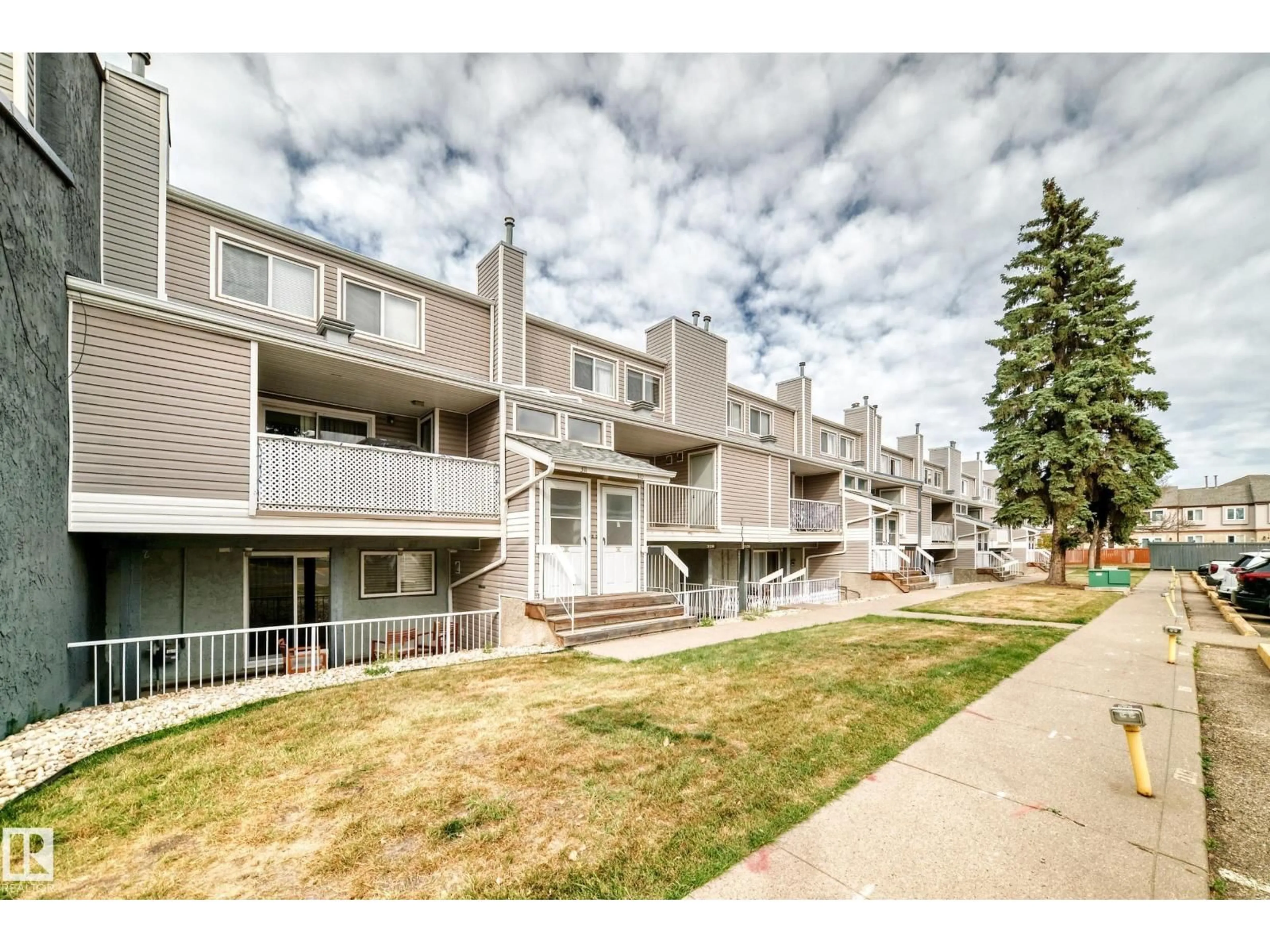 A pic from outside/outdoor area/front of a property/back of a property/a pic from drone, unknown for 310 - 10404 24 AV, Edmonton Alberta T6J4J7