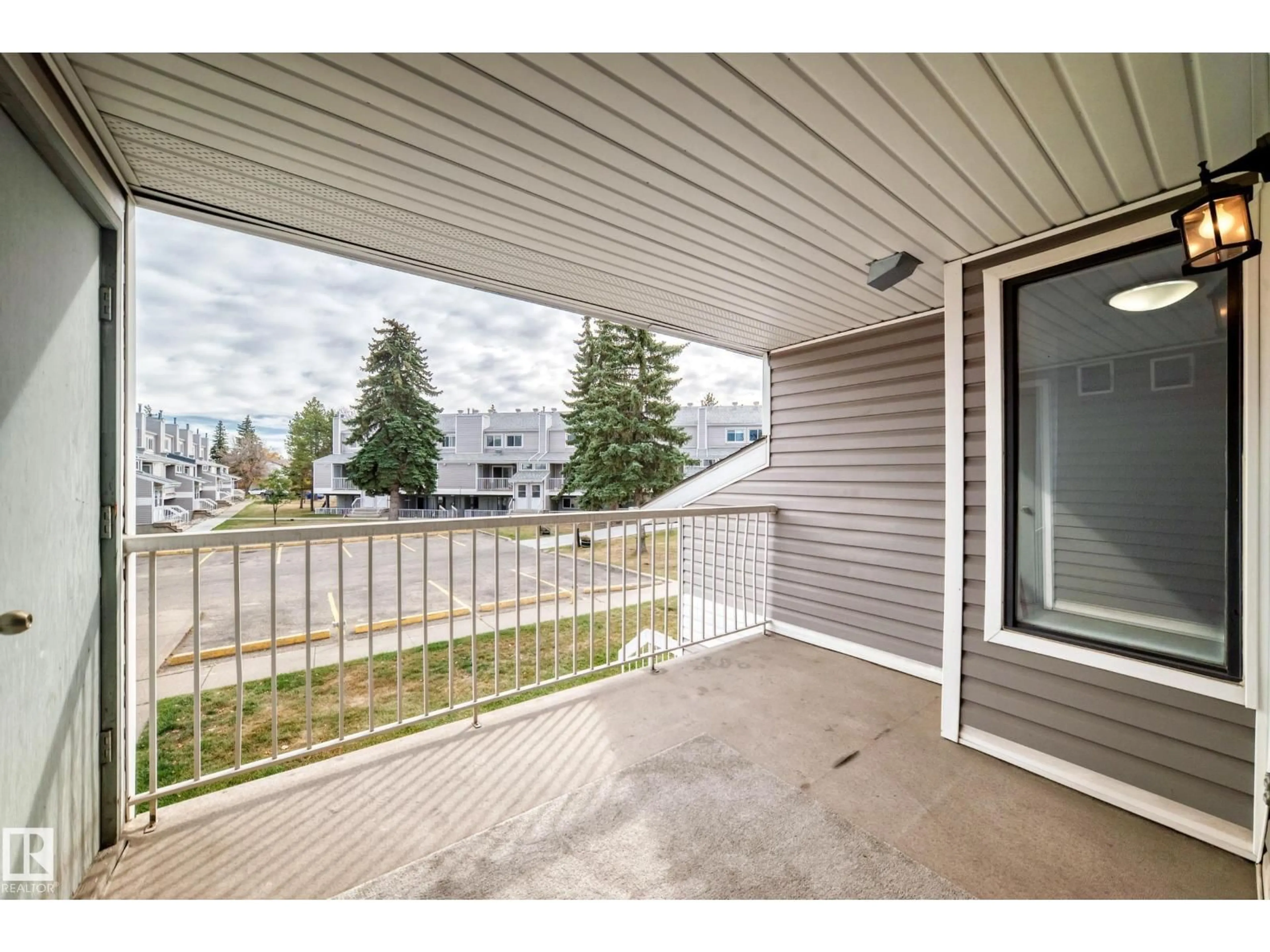 Patio, water/lake/river/ocean view for 310 - 10404 24 AV, Edmonton Alberta T6J4J7