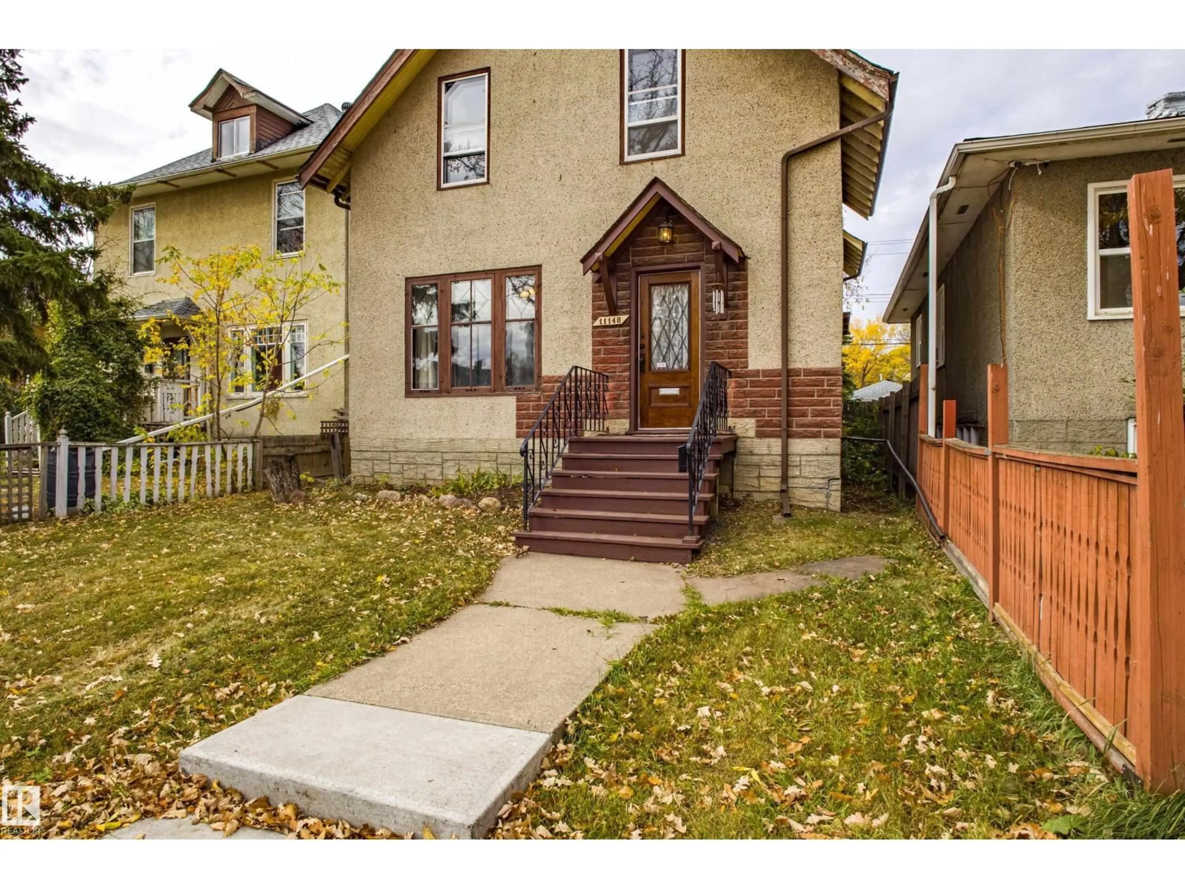 Home with brick exterior material, street for 11148 96 ST, Edmonton Alberta T5G1S7