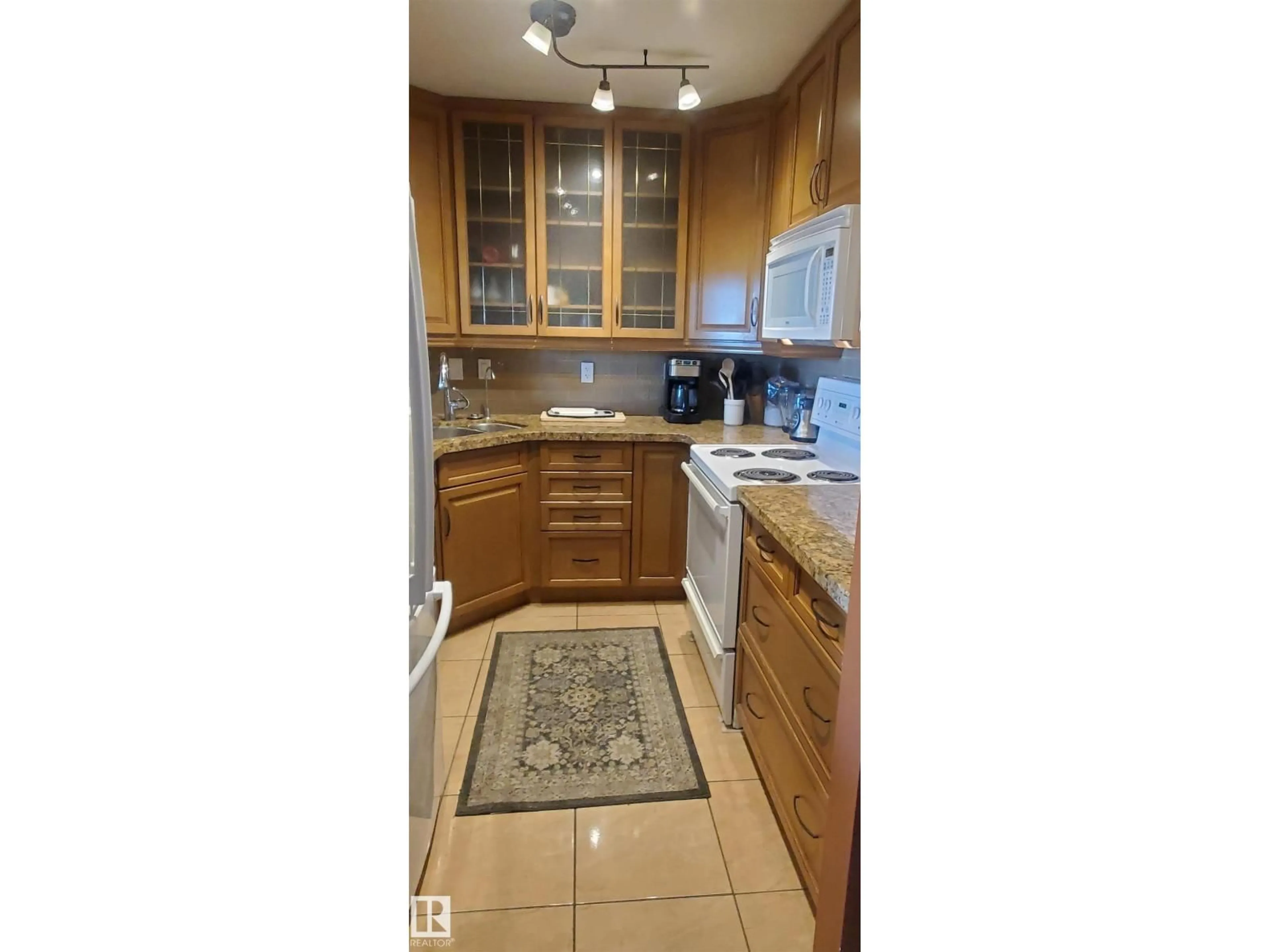 Standard kitchen, ceramic/tile floor for #415 - 5520 RIVERBEND RD, Edmonton Alberta T6H5G9