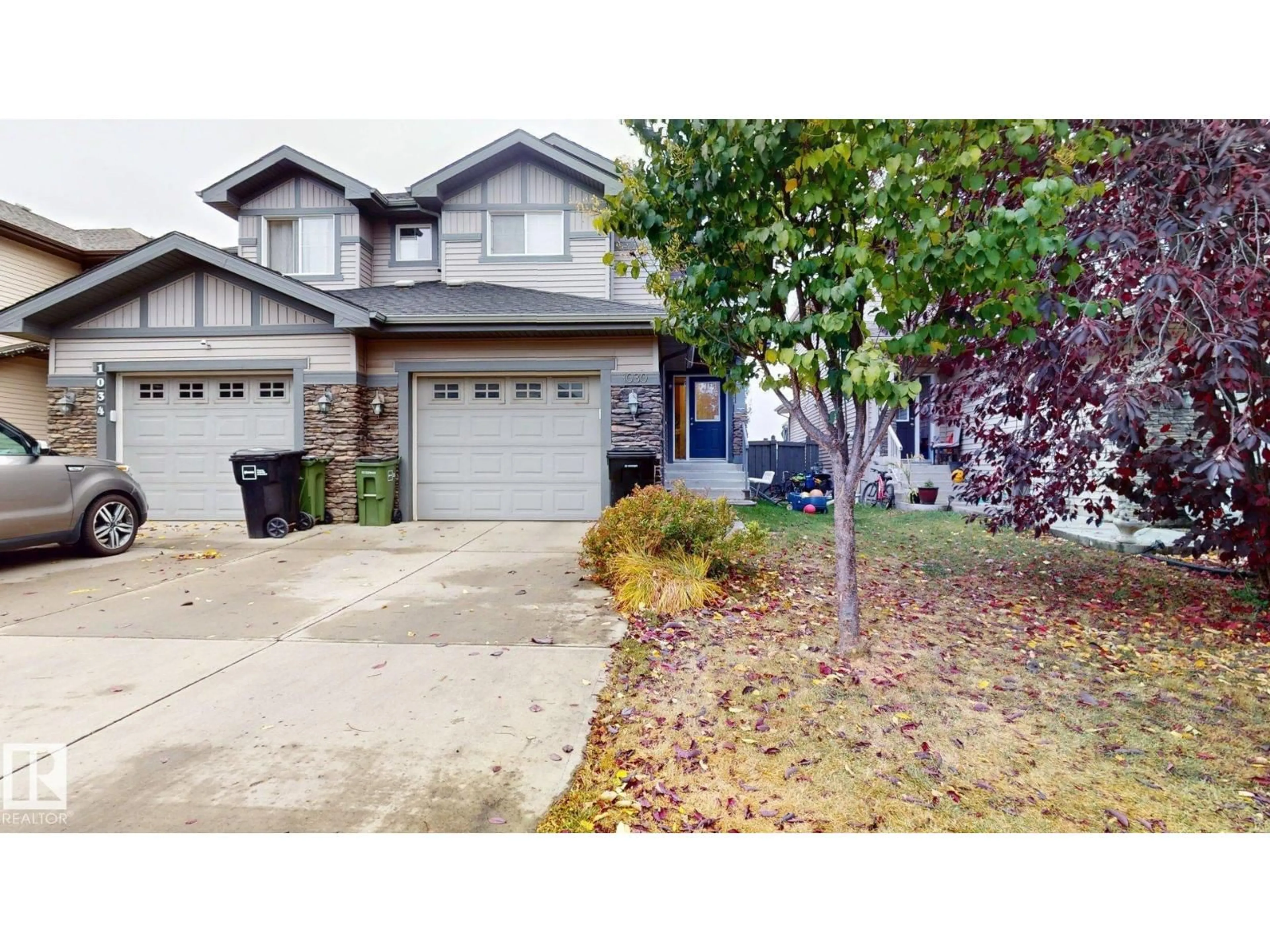 Home with vinyl exterior material, street for SW - 1030 177A ST, Edmonton Alberta T6W2A1