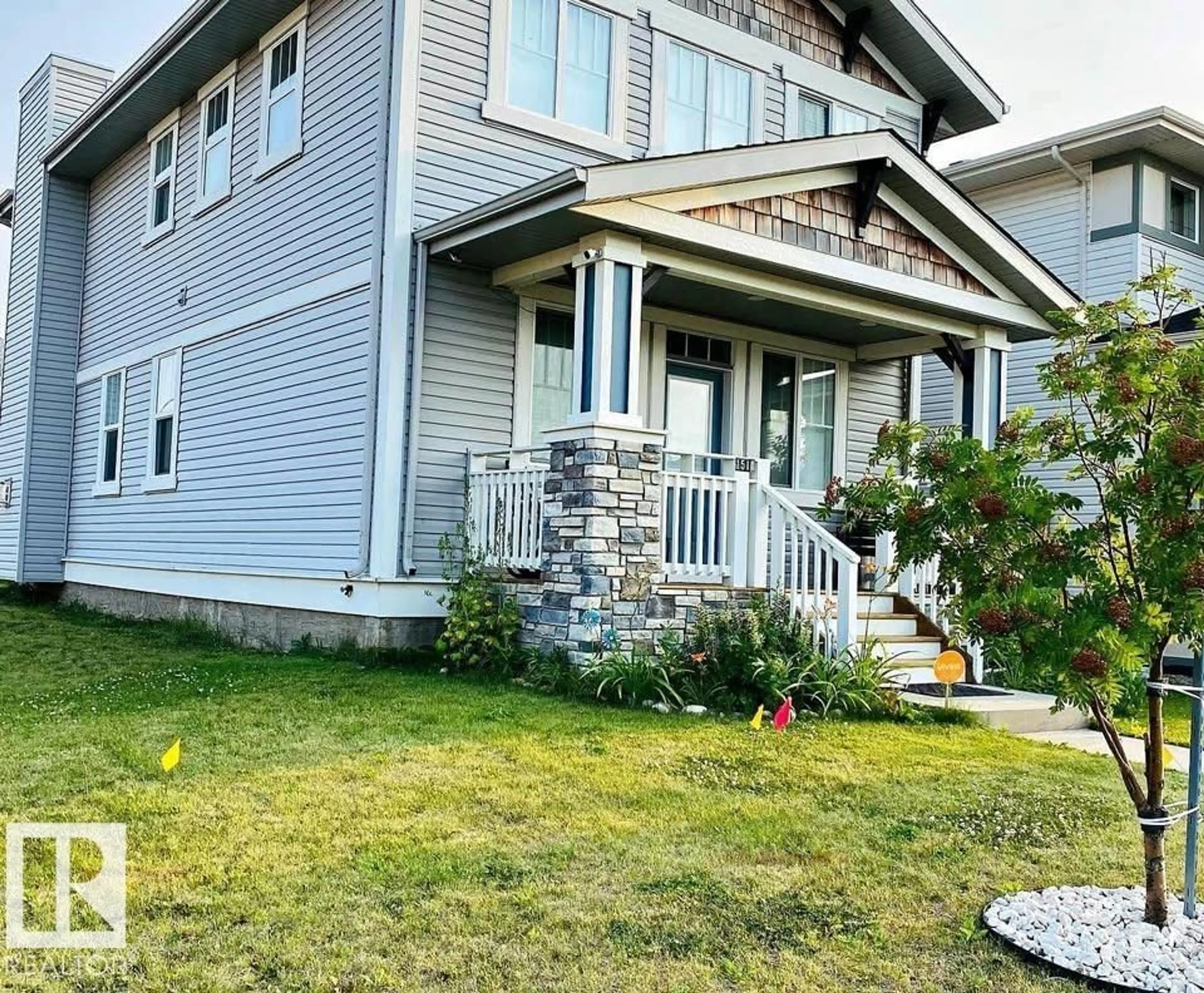 Home with vinyl exterior material, street for 1511 SECORD RD, Edmonton Alberta T5T7B4