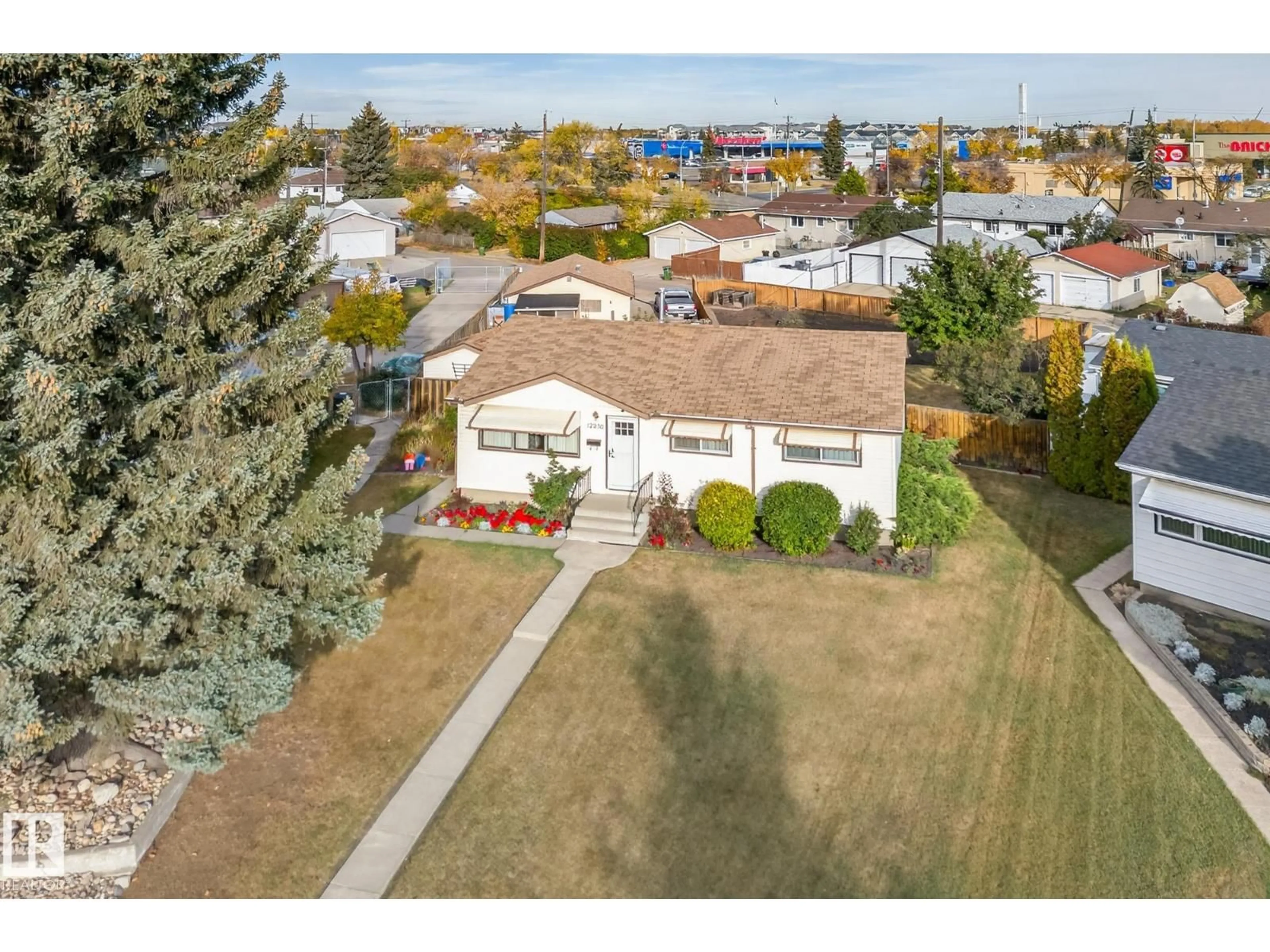 A pic from outside/outdoor area/front of a property/back of a property/a pic from drone, street for 12236 136 AV, Edmonton Alberta T5L4A6