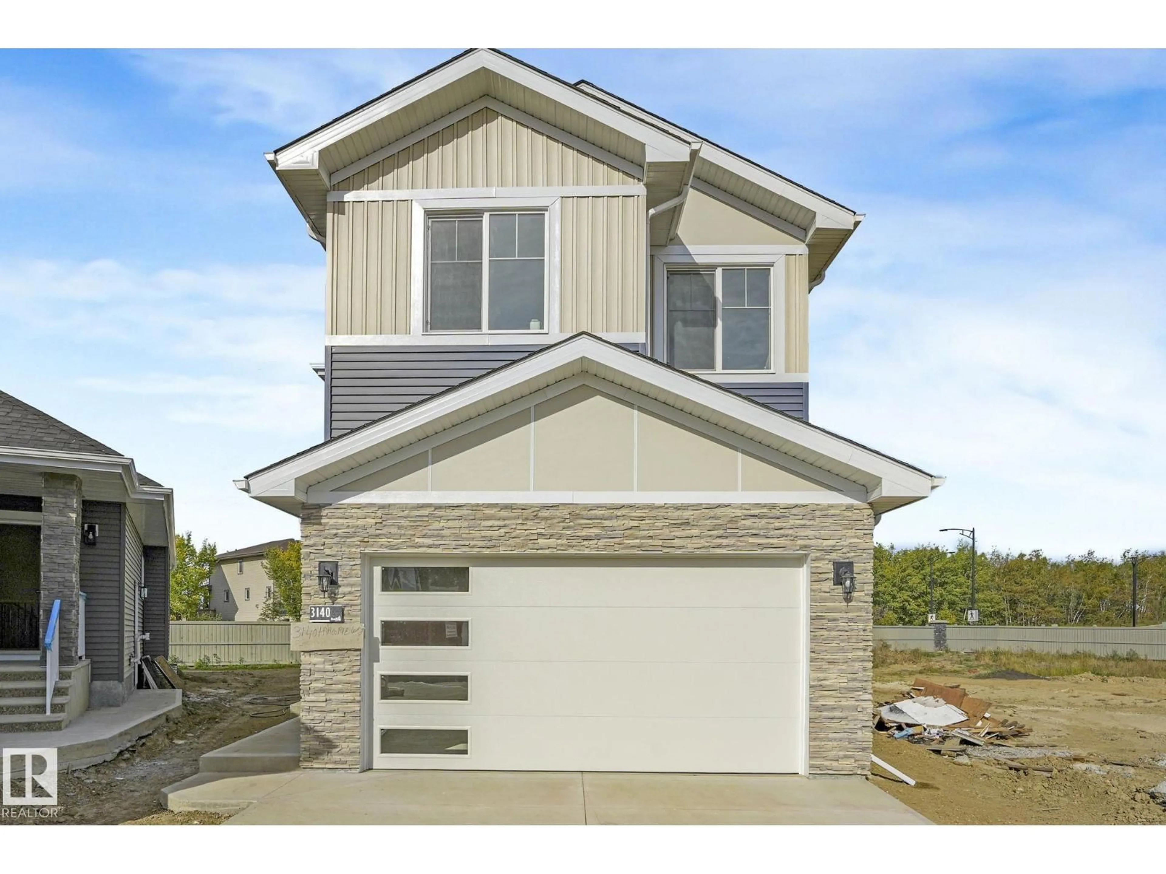 Home with vinyl exterior material, street for 3136 MAGPIE WAY, Edmonton Alberta T5S0E1