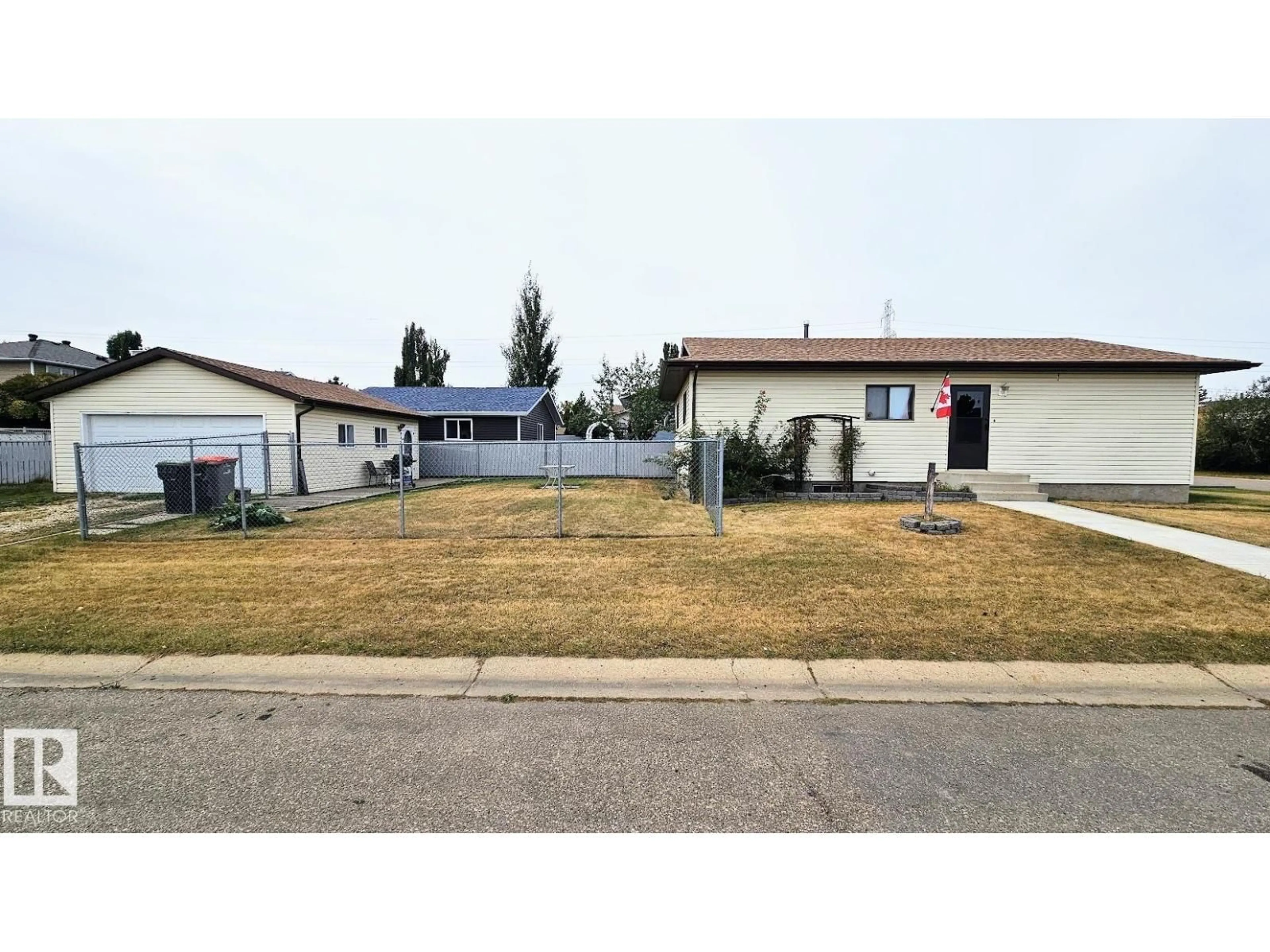 A pic from outside/outdoor area/front of a property/back of a property/a pic from drone, street for 284 PORTER AV, Millet Alberta T0C1Z0