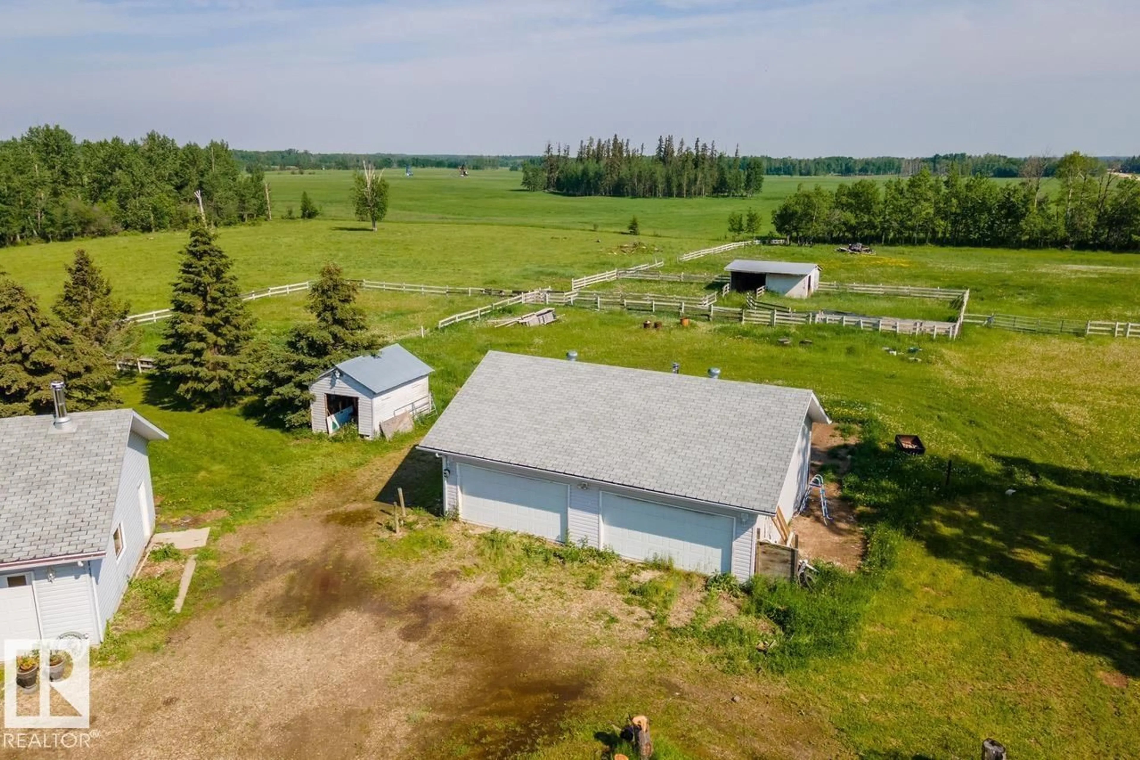 A pic from outside/outdoor area/front of a property/back of a property/a pic from drone, unknown for 55428 HWY 765, Cherhill Alberta T0E0J0