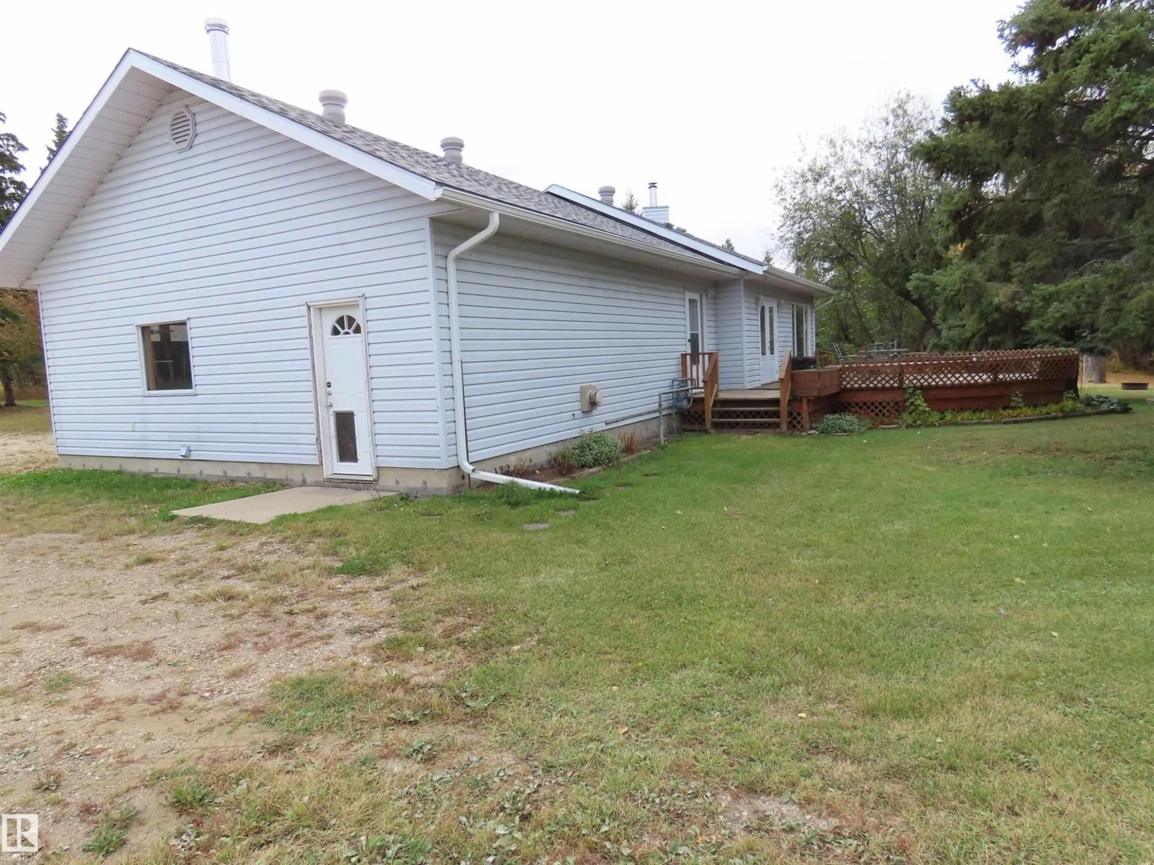 A pic from outside/outdoor area/front of a property/back of a property/a pic from drone, unknown for 55428 HWY 765, Cherhill Alberta T0E0J0