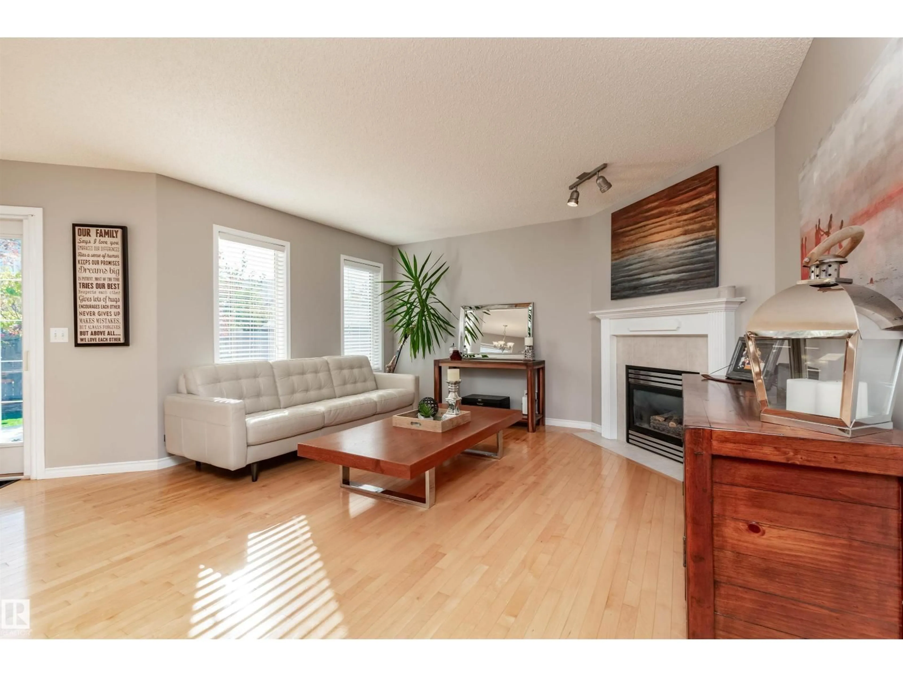 Living room with furniture, wood/laminate floor for 109 FOXBORO RD, Sherwood Park Alberta T8A6M6