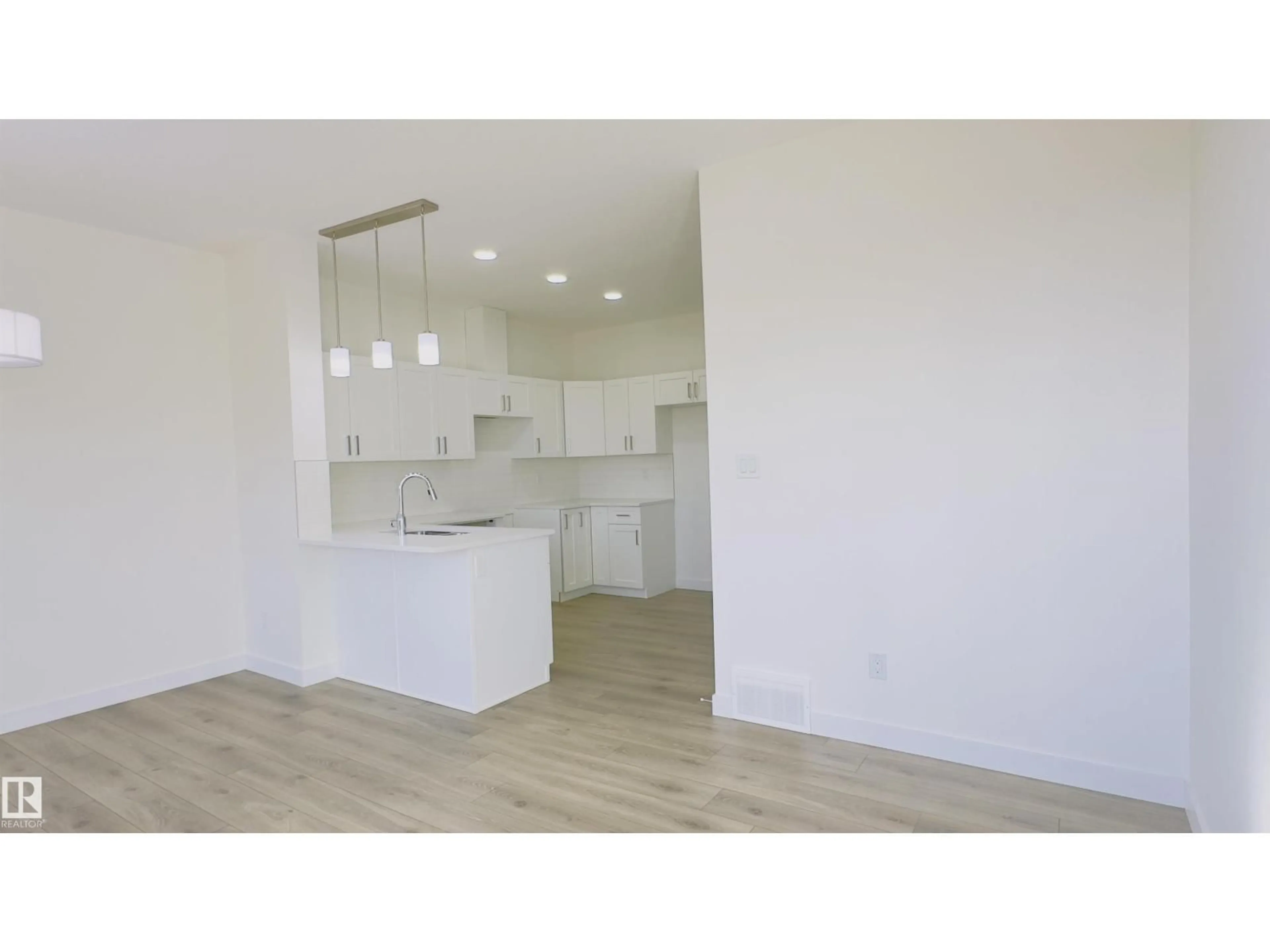 Open concept kitchen, unknown for #11 - 2710 66 ST, Edmonton Alberta T6X3H4