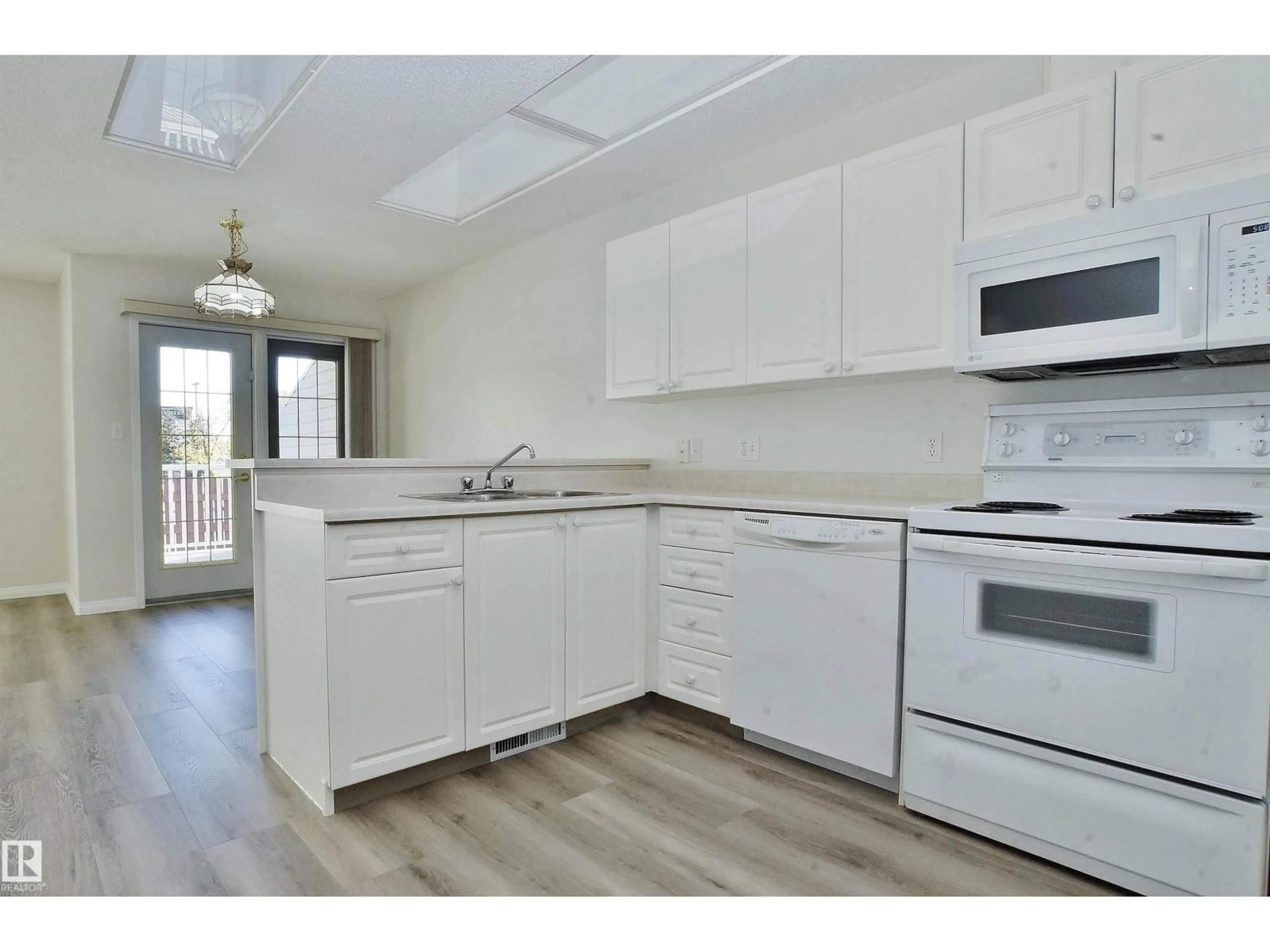 Standard kitchen, wood/laminate floor for 7 - 7 CRANFORD WY, Sherwood Park Alberta T8A5W5