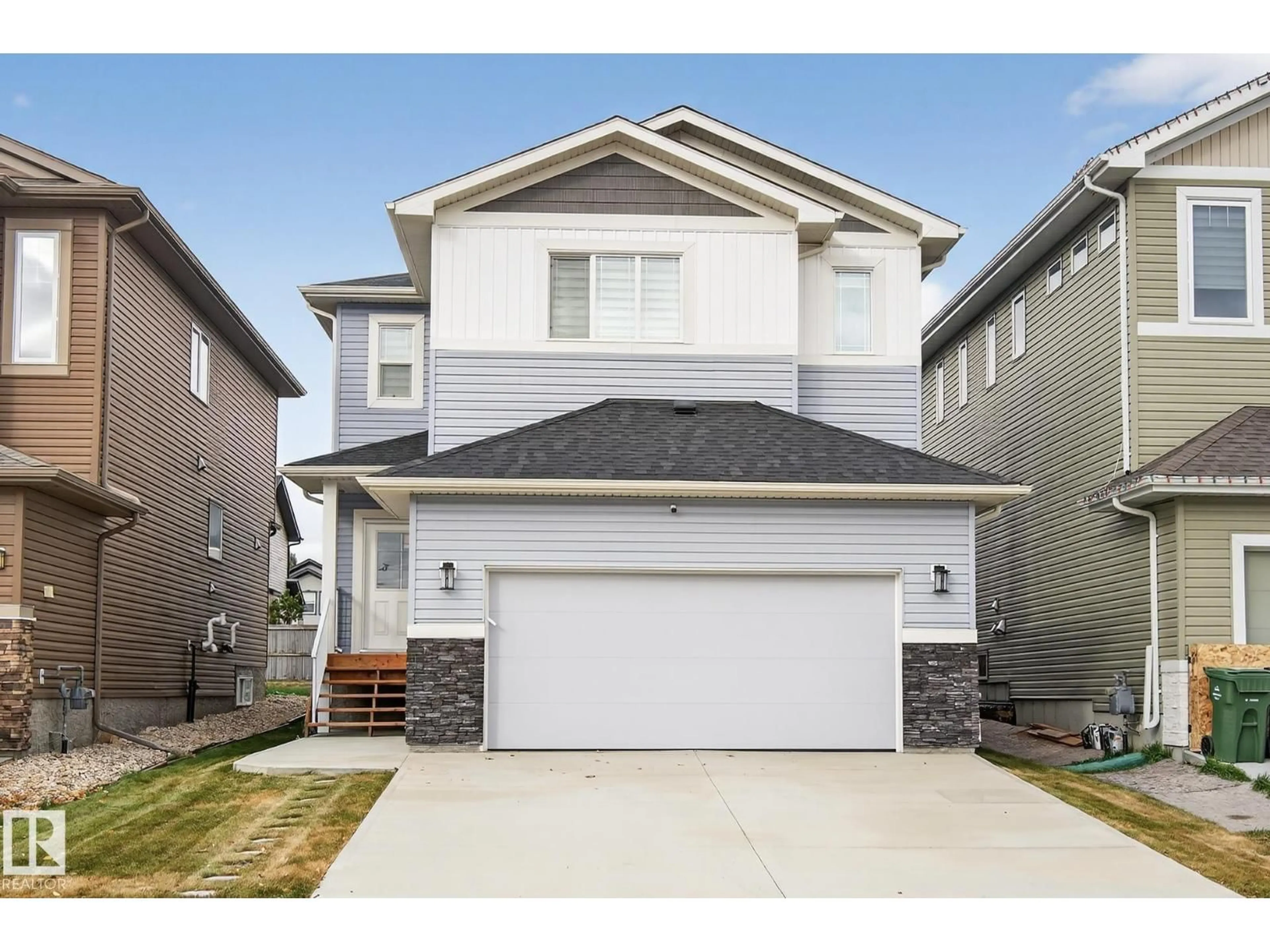 Home with vinyl exterior material, street for 575 REYNALDS WYND, Leduc Alberta T0C2K0